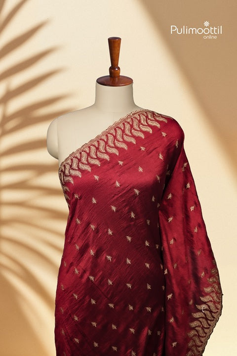 Reddish Maroon Vijithra Silk Golden Zari Butta Work On Body.