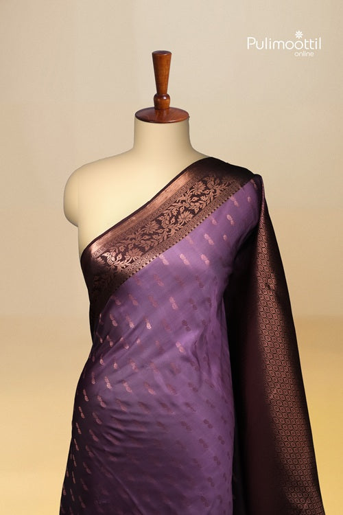 Lavender Semi Silk Saree With Contrast Coffee Brown Border.