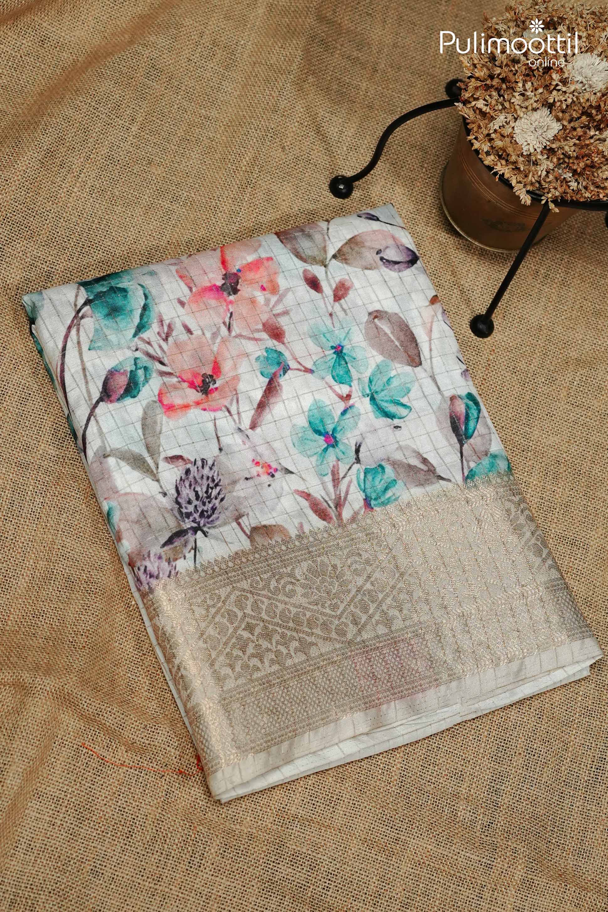 White Colour Semi Tussar Saree.