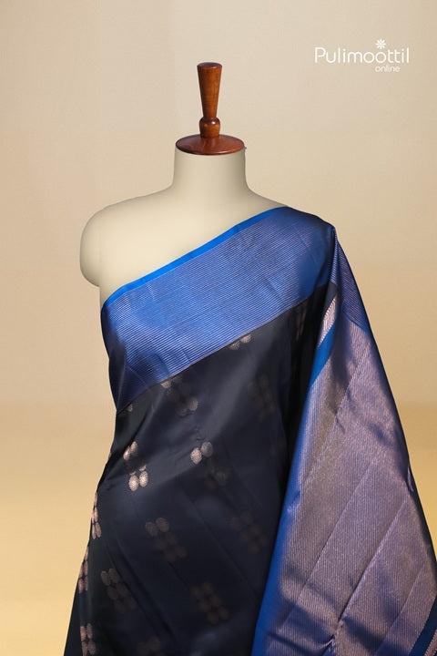 Dark Navy Blue Kanchipuram Silk Saree with Copper Butta and Contrast Borders.