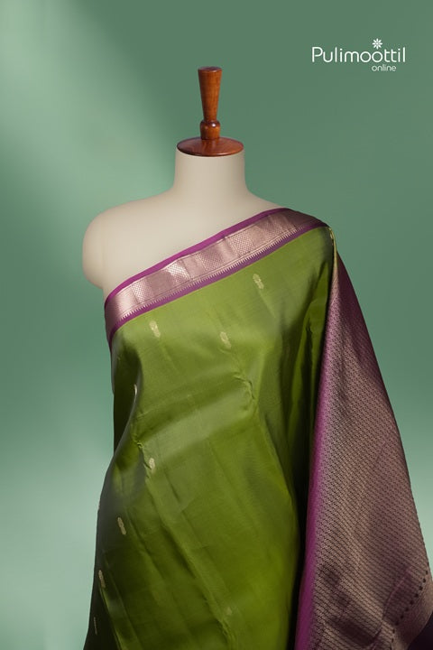 Olive Green Kanchipuram Silk Saree with Contrast Border.
