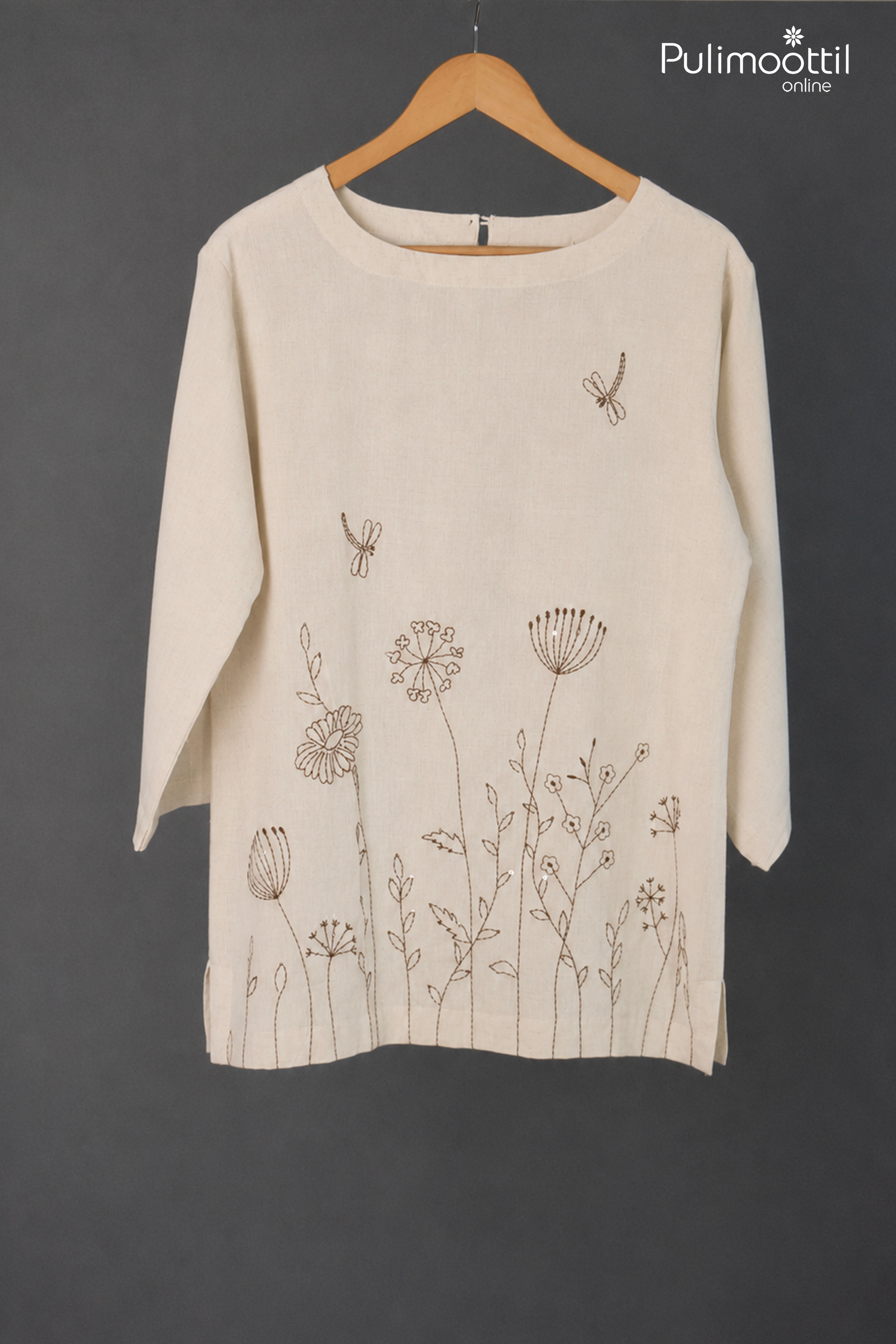 Off White Color Ladies Top Featuring Nature-Inspired Floral Thread Work