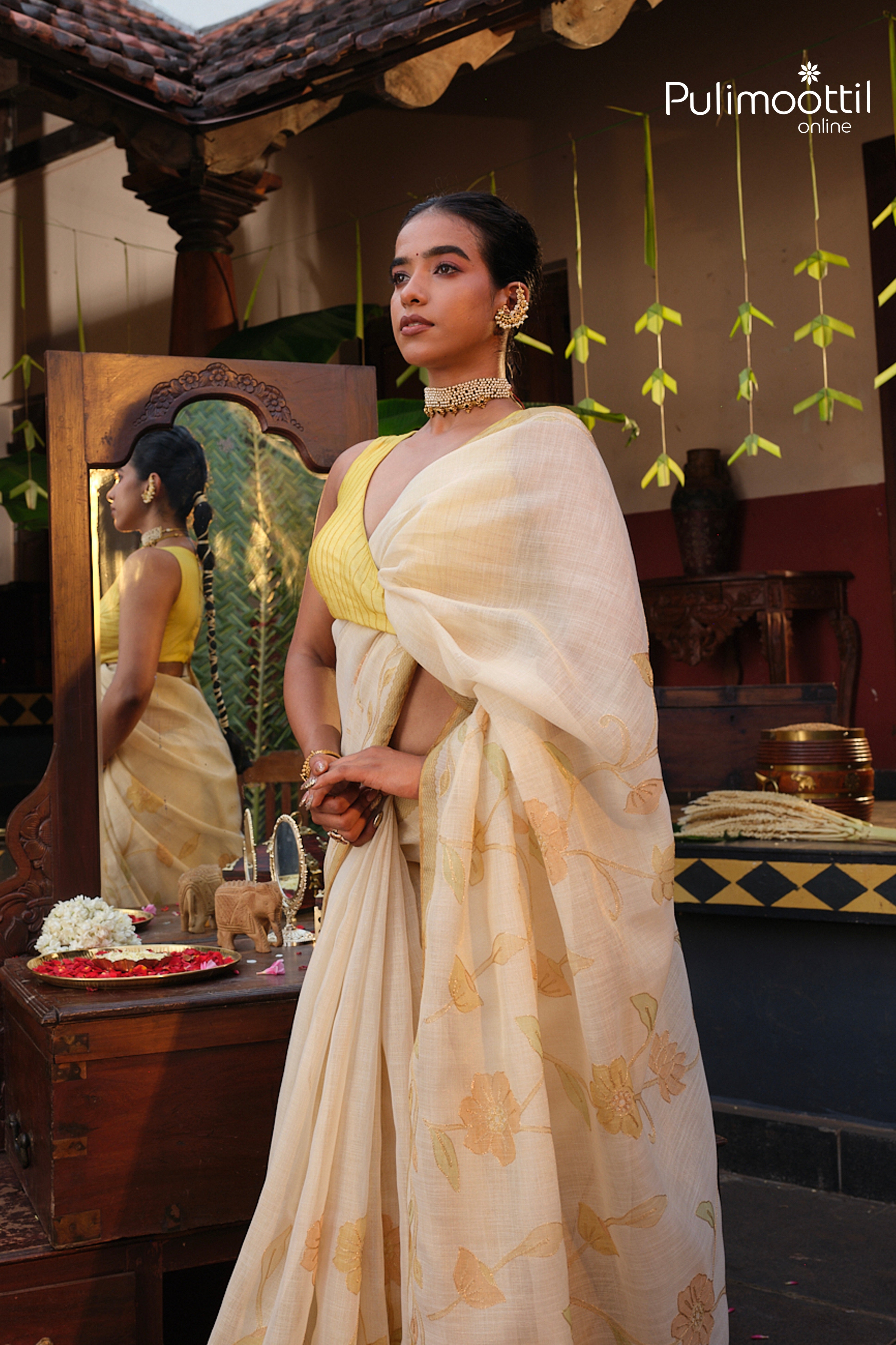 Offwhite Colour Golden Tissue Traditional Saree