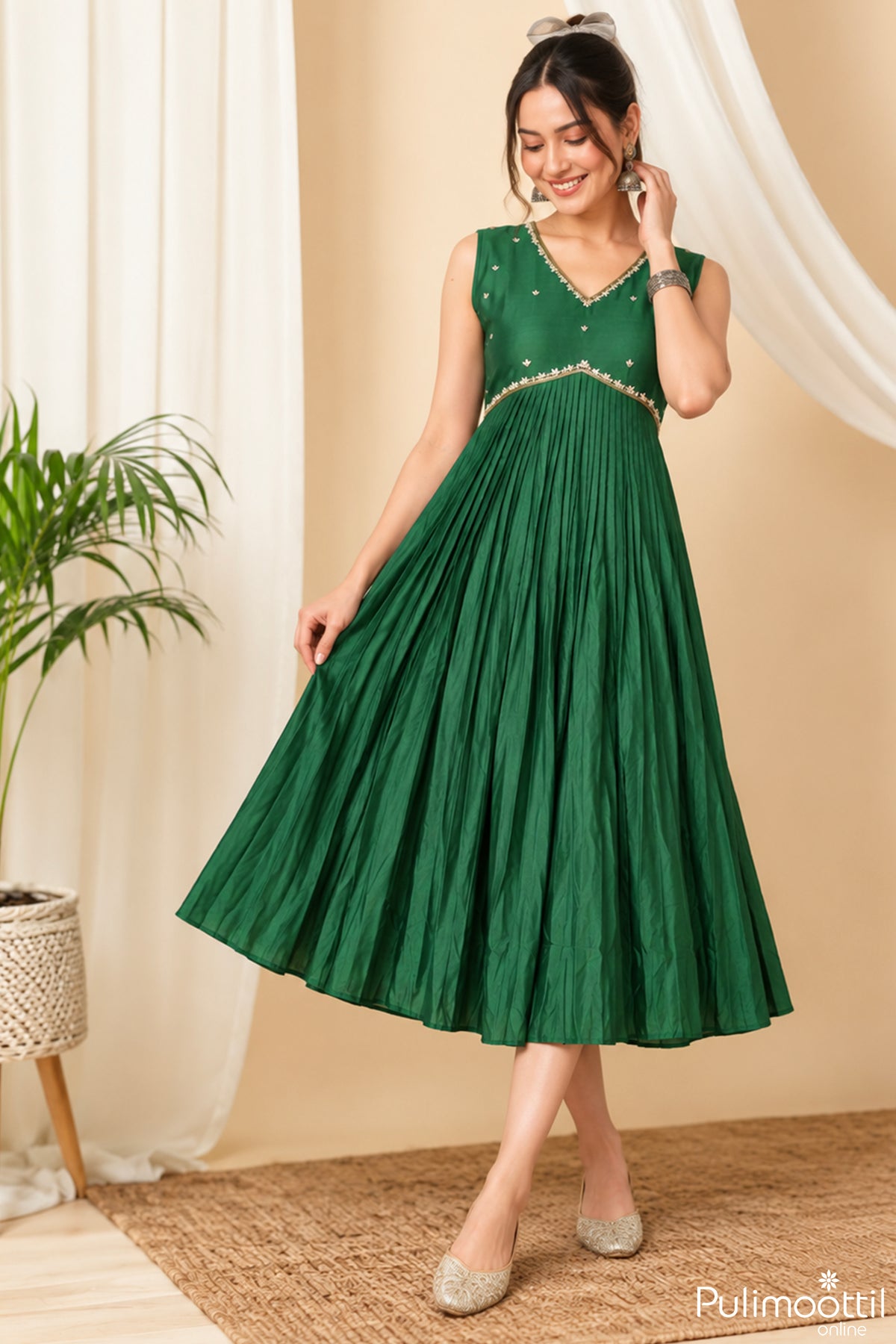 Bottle green Chanderi A-line kurti.