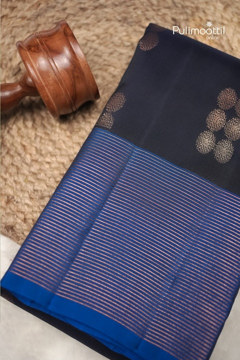Dark Navy Blue Kanchipuram Silk Saree with Copper Butta and Contrast Borders.