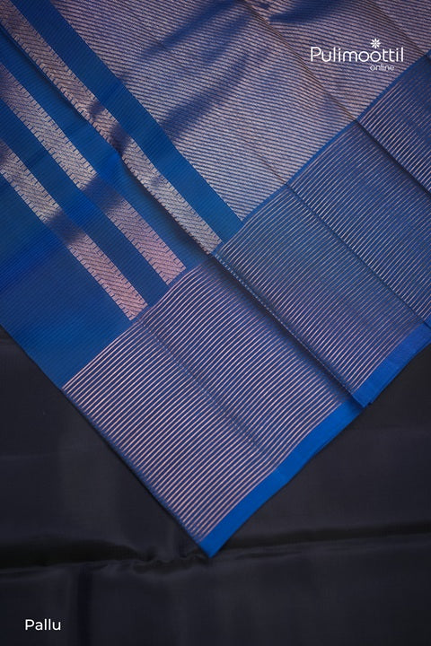 Dark Navy Blue Kanchipuram Silk Saree with Copper Butta and Contrast Borders.