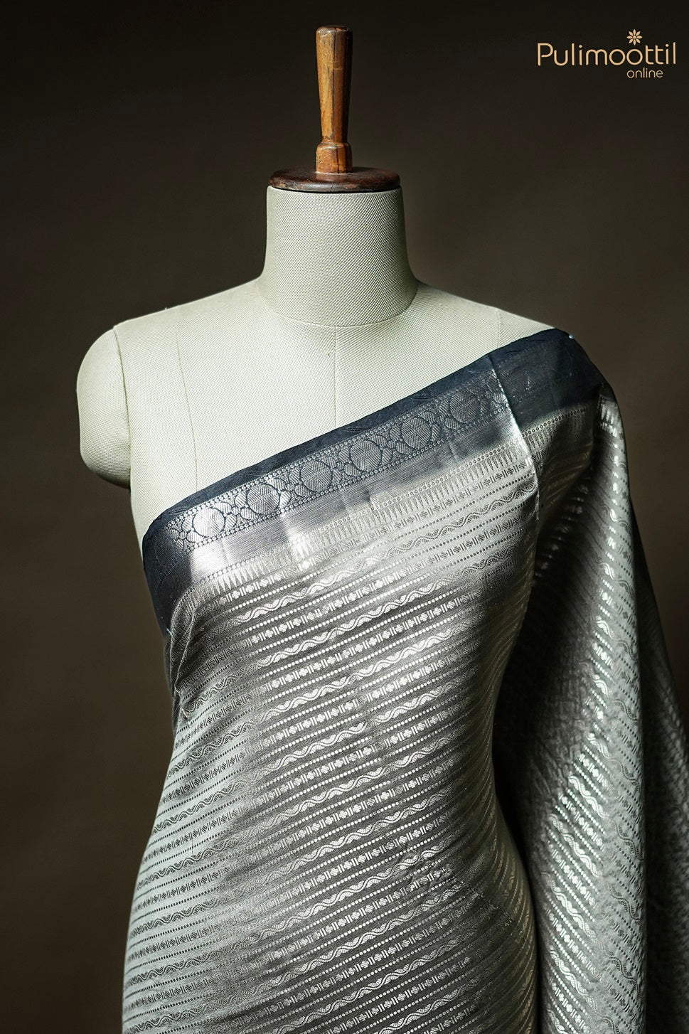 Pastel Olive Green Chiniya Silk Saree.