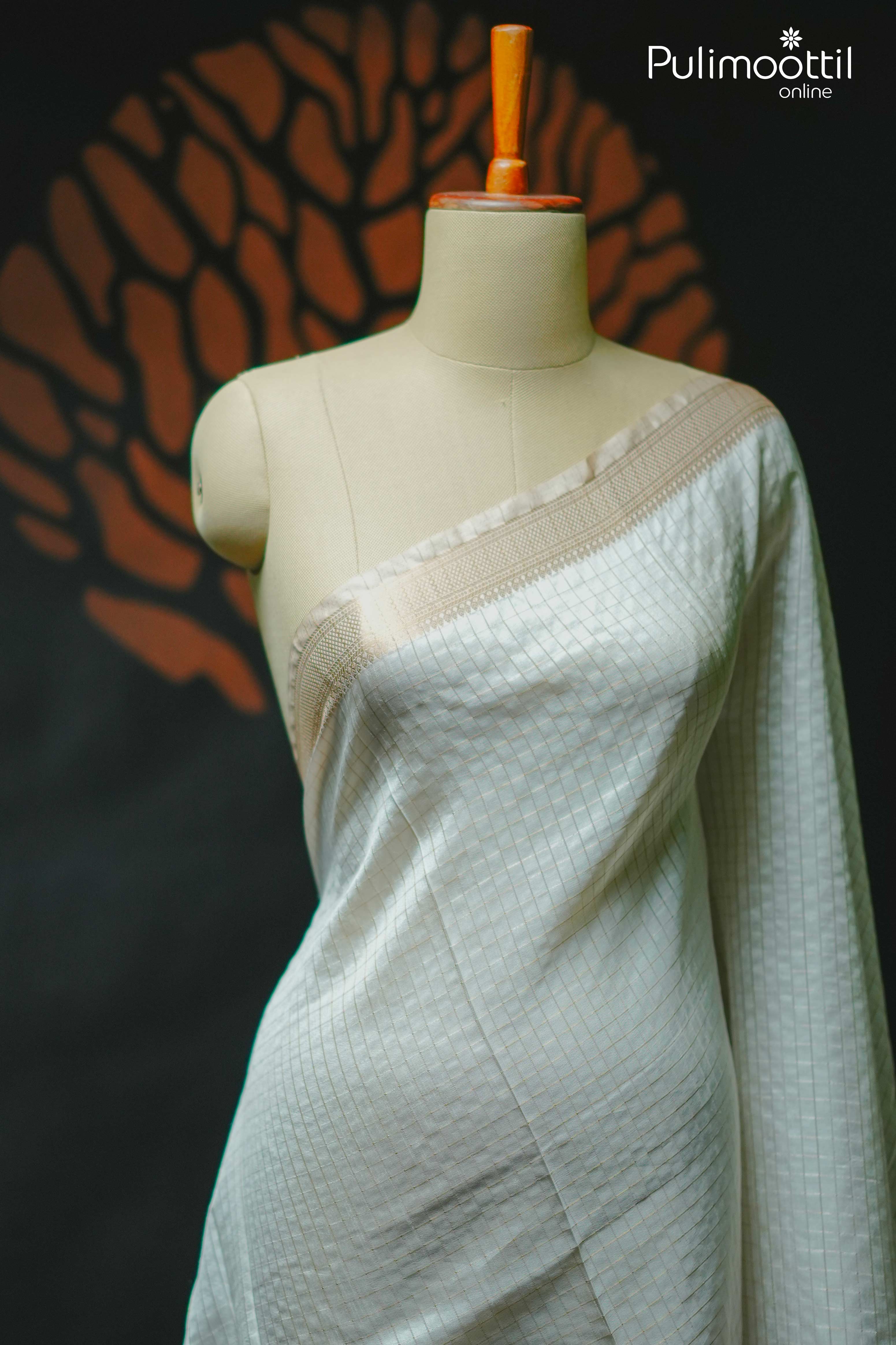 White Colour Semi Tussar Saree.