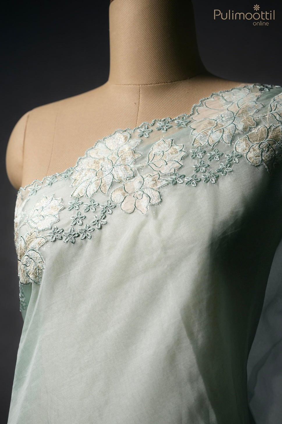Pastel mint green color organza fancy saree