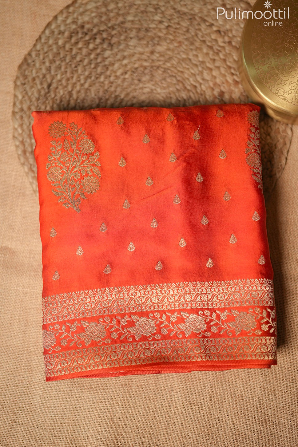 Reddish orange color Banarasi saree