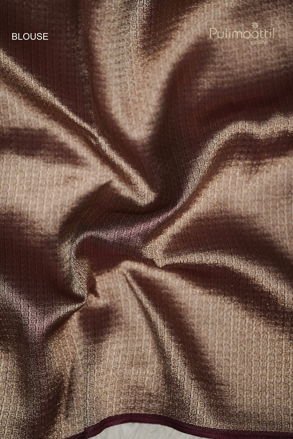 Swatch of the Blouse Fabric in shimmering gold/bronze with a small woven self-check pattern (or small squares/buttas).