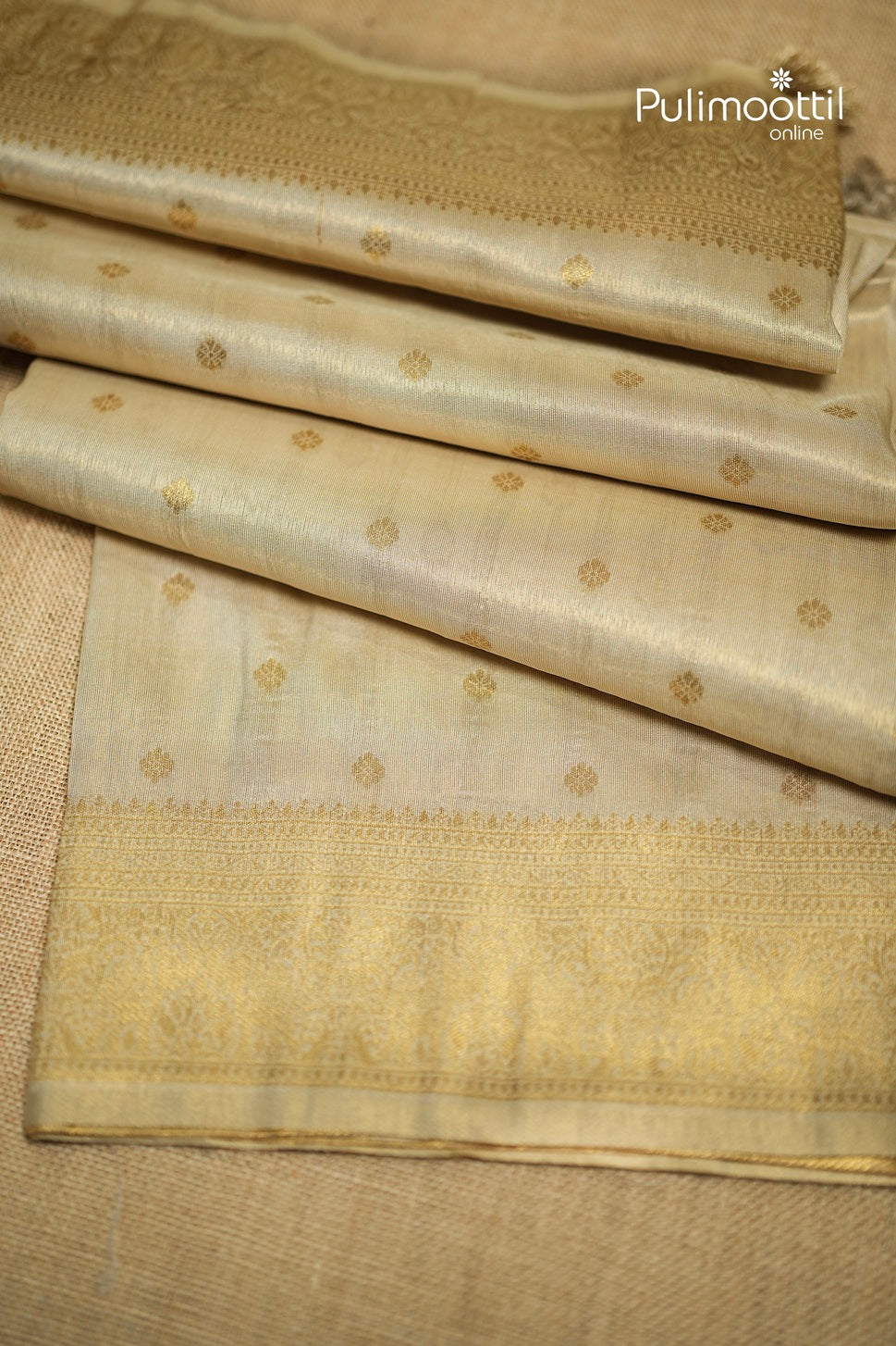 Offwhite Colour Golden Tissue Traditional Fancy Saree