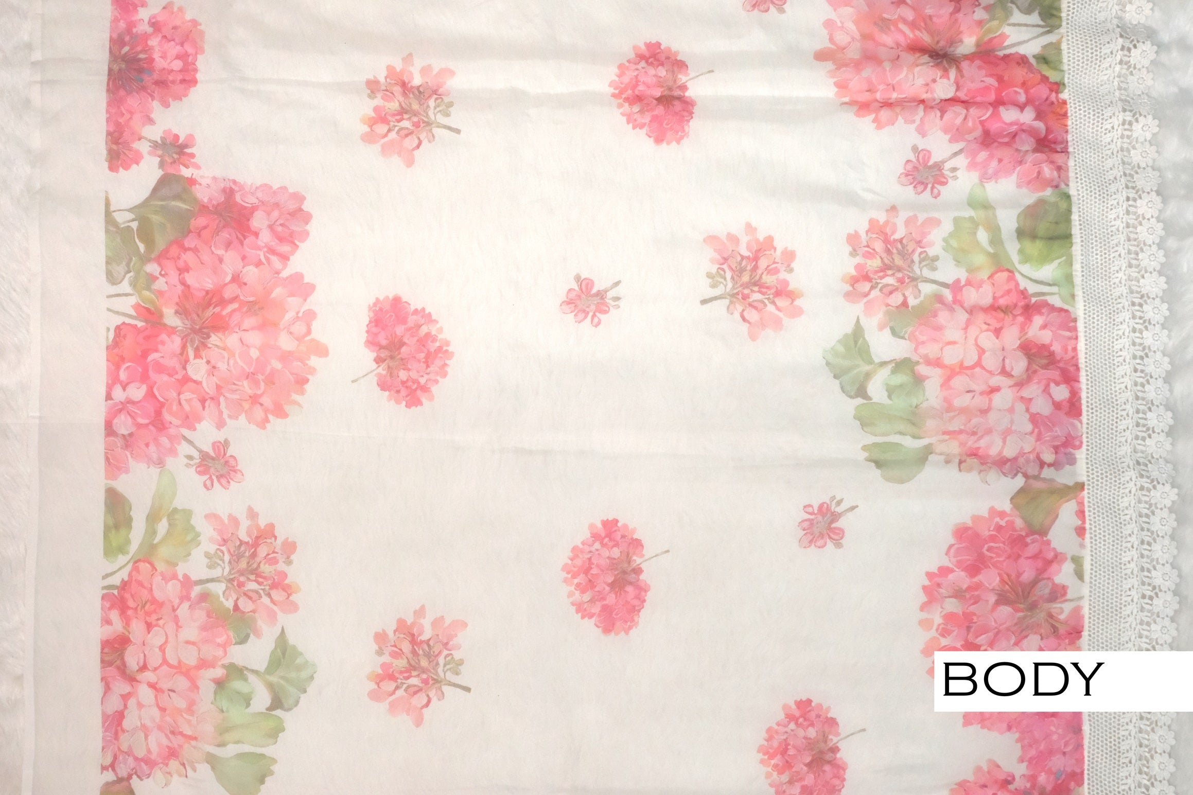 White color soft Organza printed saree.
