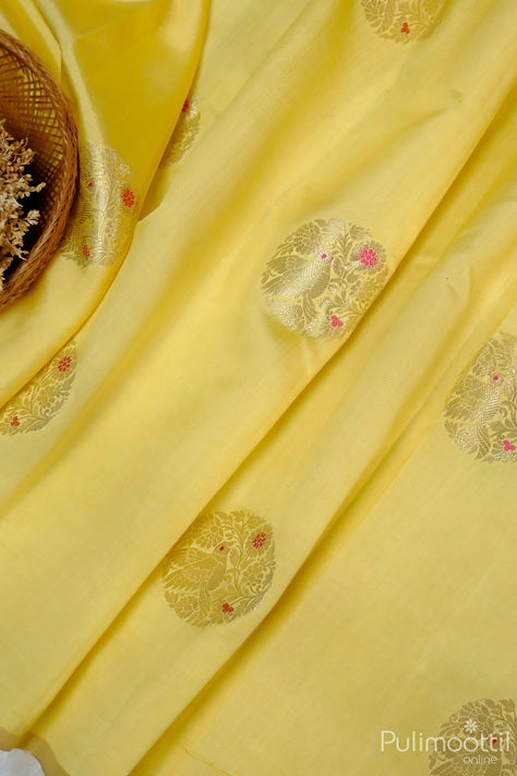 Flax Golden Yellow Colour Pure Chiniya Banarasi Silk Saree.