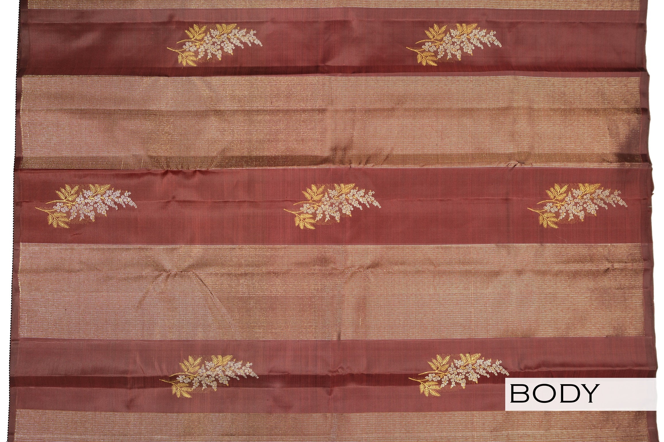 Coffee brown color Kanchipuram saree.