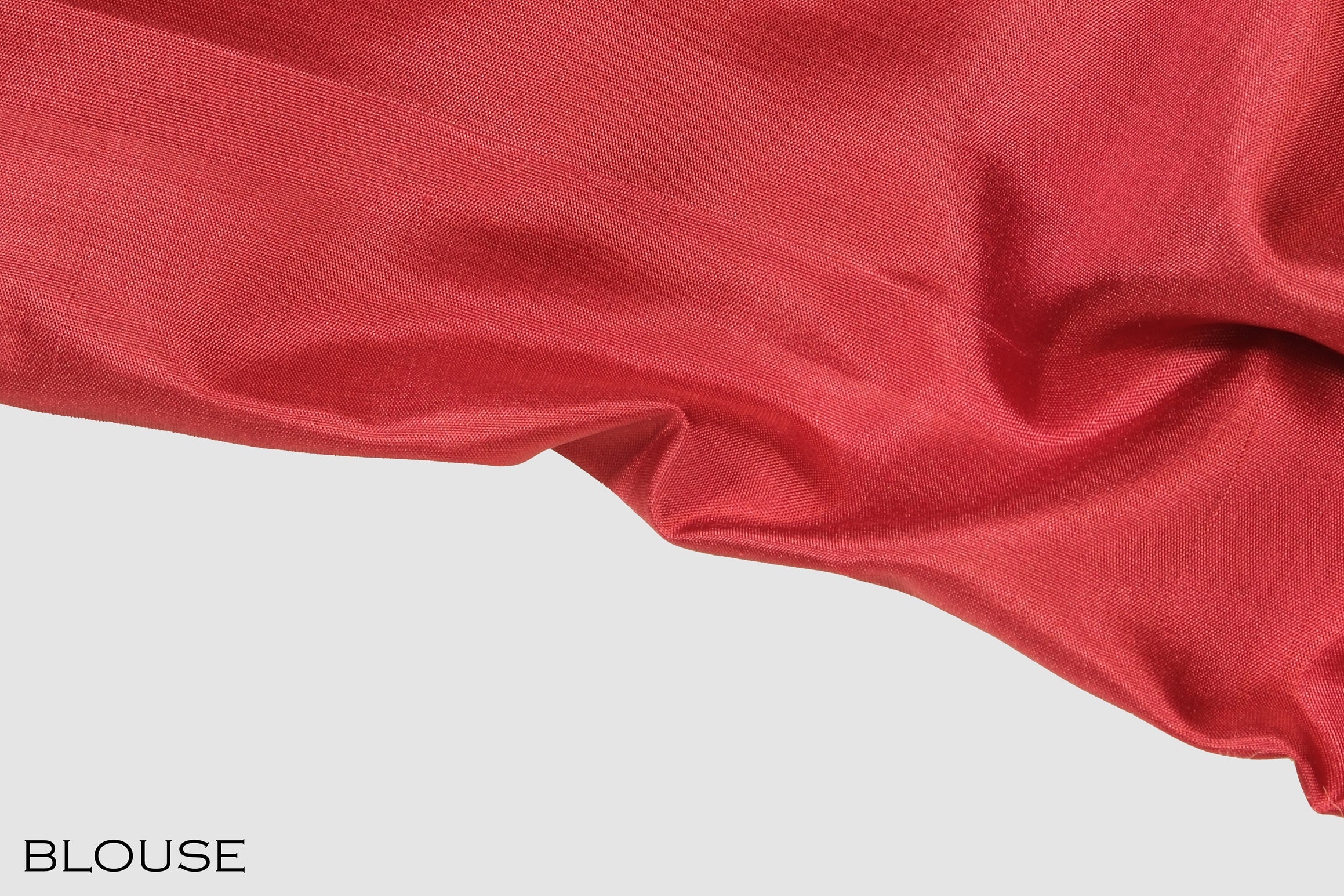 Red color pure Kanchipuram silk saree.