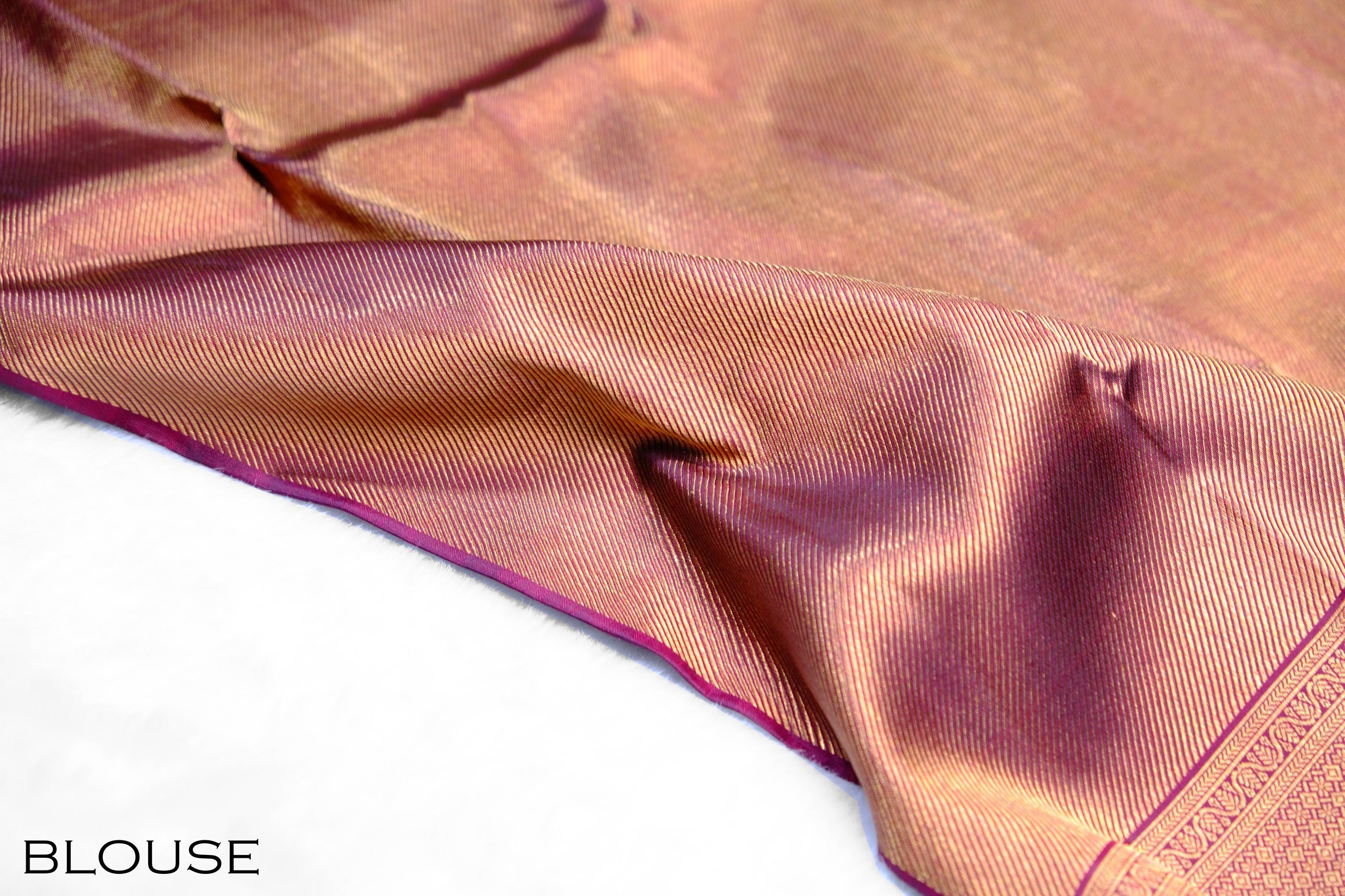 Magenta color Kanchipuram wedding saree.