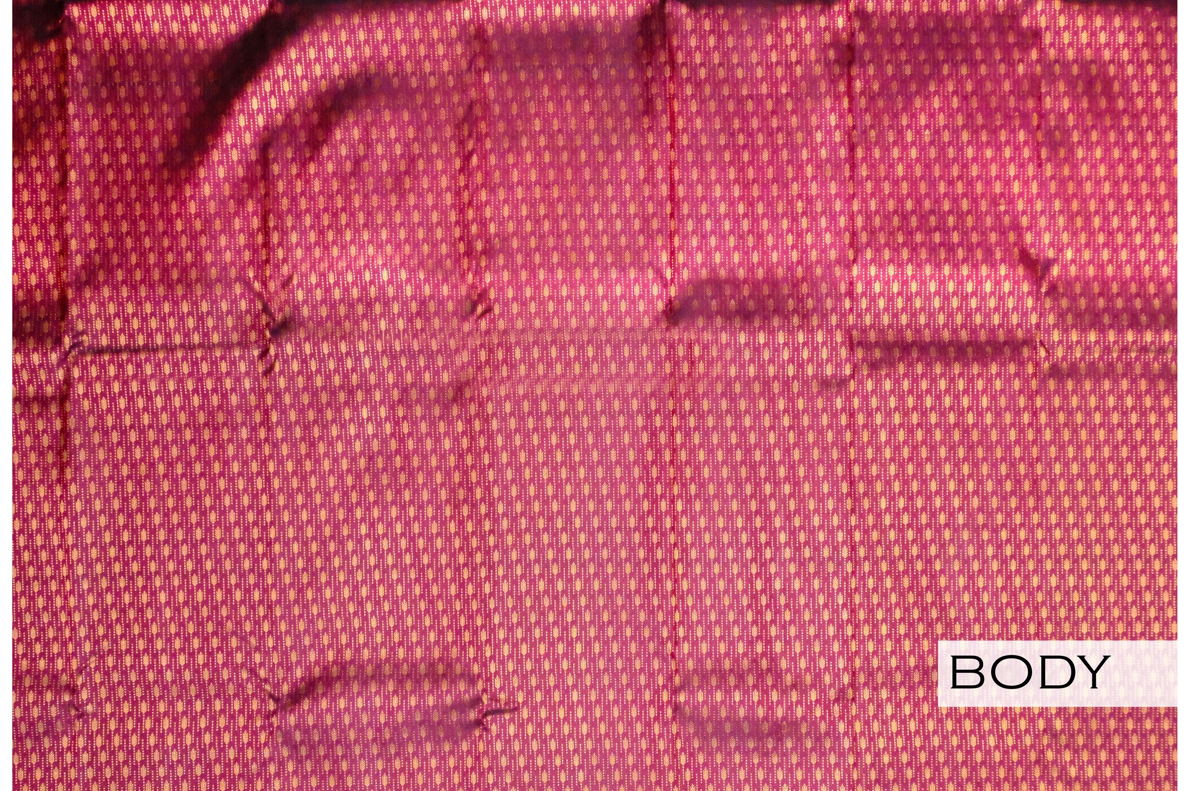 Magenta color Kanchipuram wedding saree.