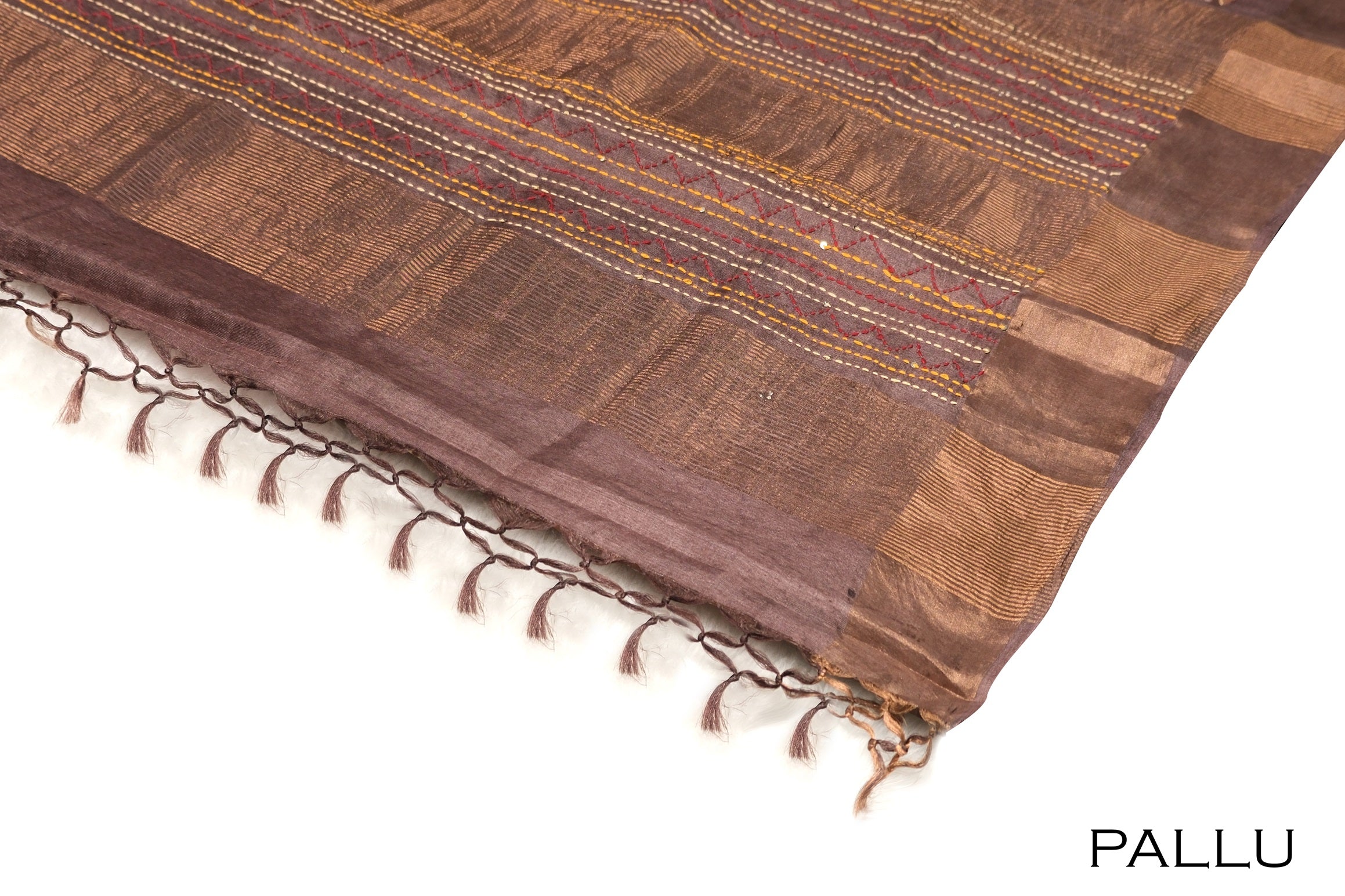 Main body portion of a saree fabric laid out flat, revealing the primary pattern, color, and textile weave.