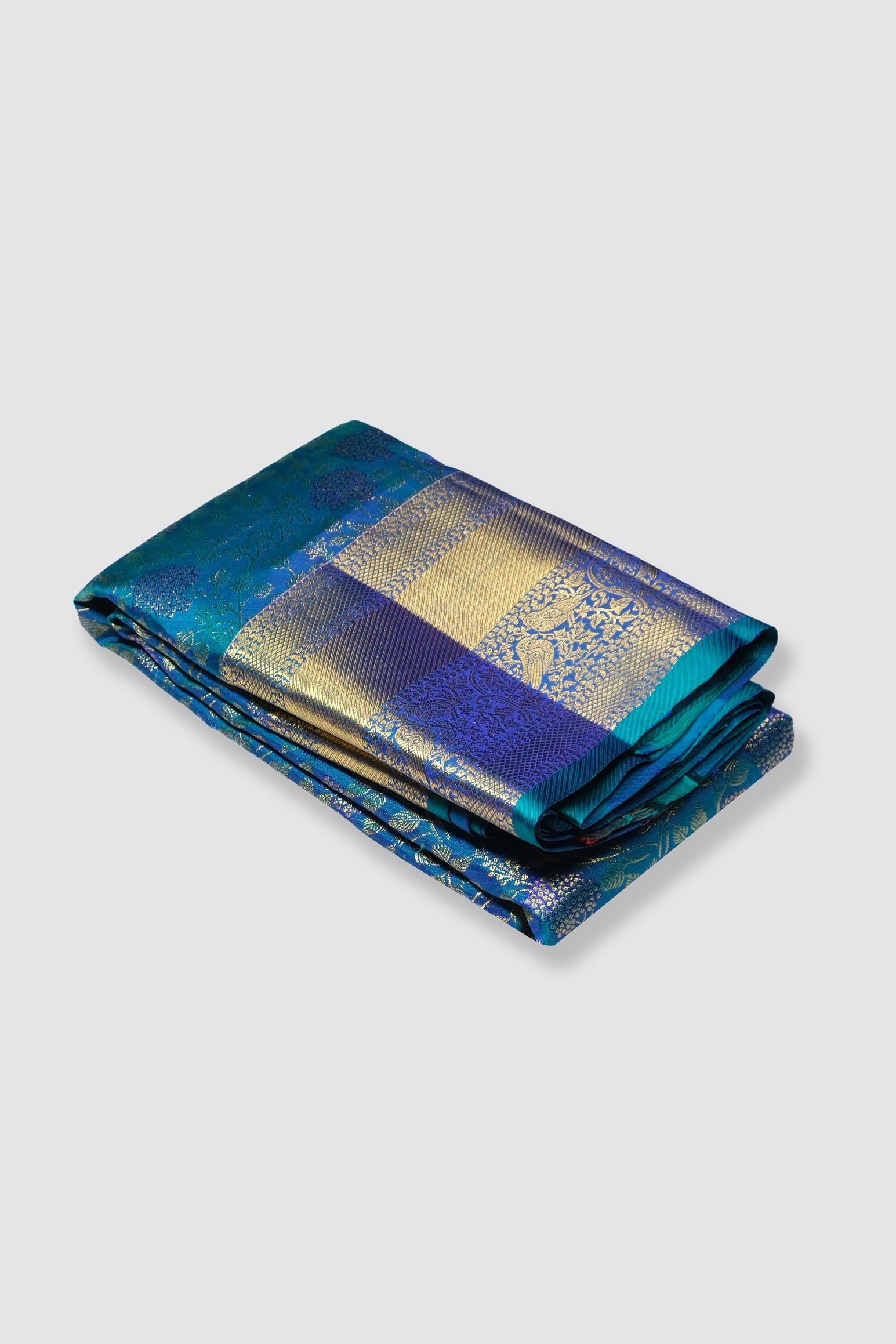 Peacock color pure Kanchipuram silk saree.