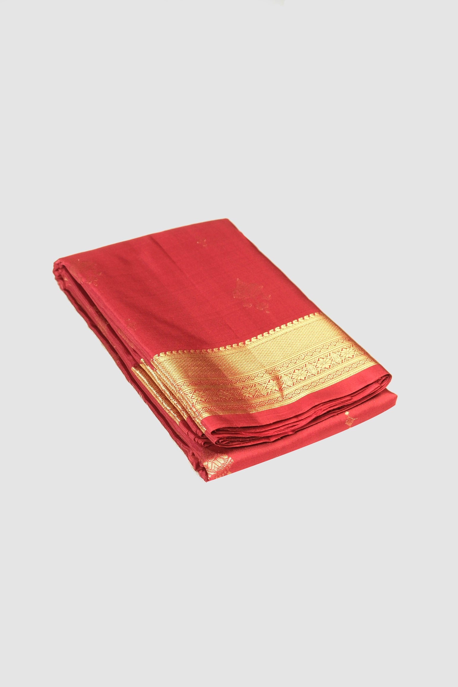 Red color pure Kanchipuram silk saree.