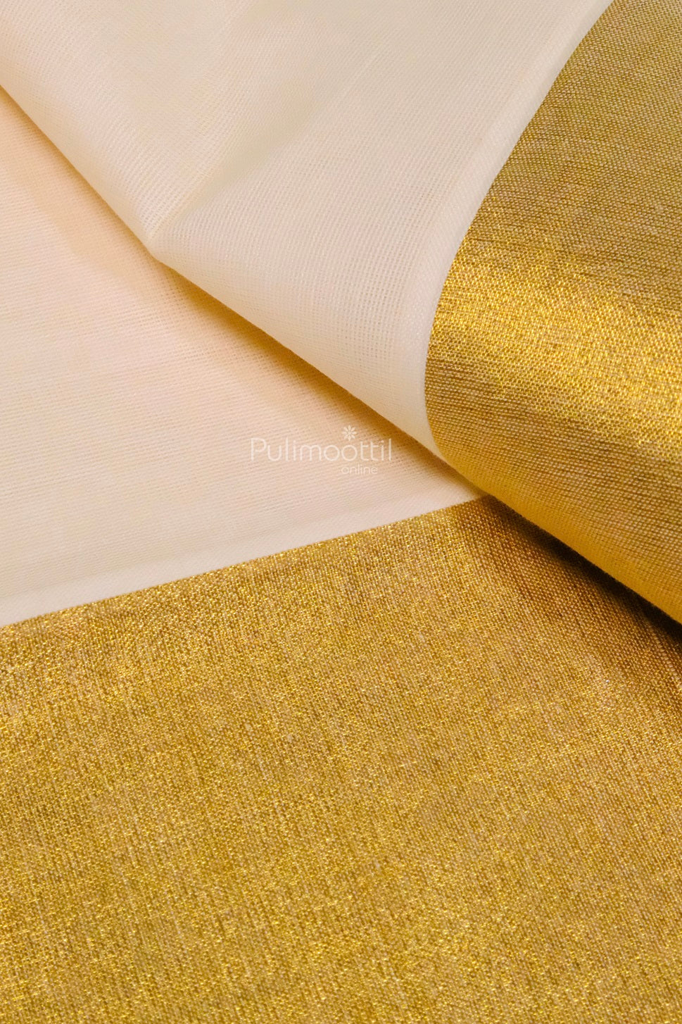 Traditional cream Kerala saree with intricate gold zari border, folded neatly with white flowers on a textured burlap background