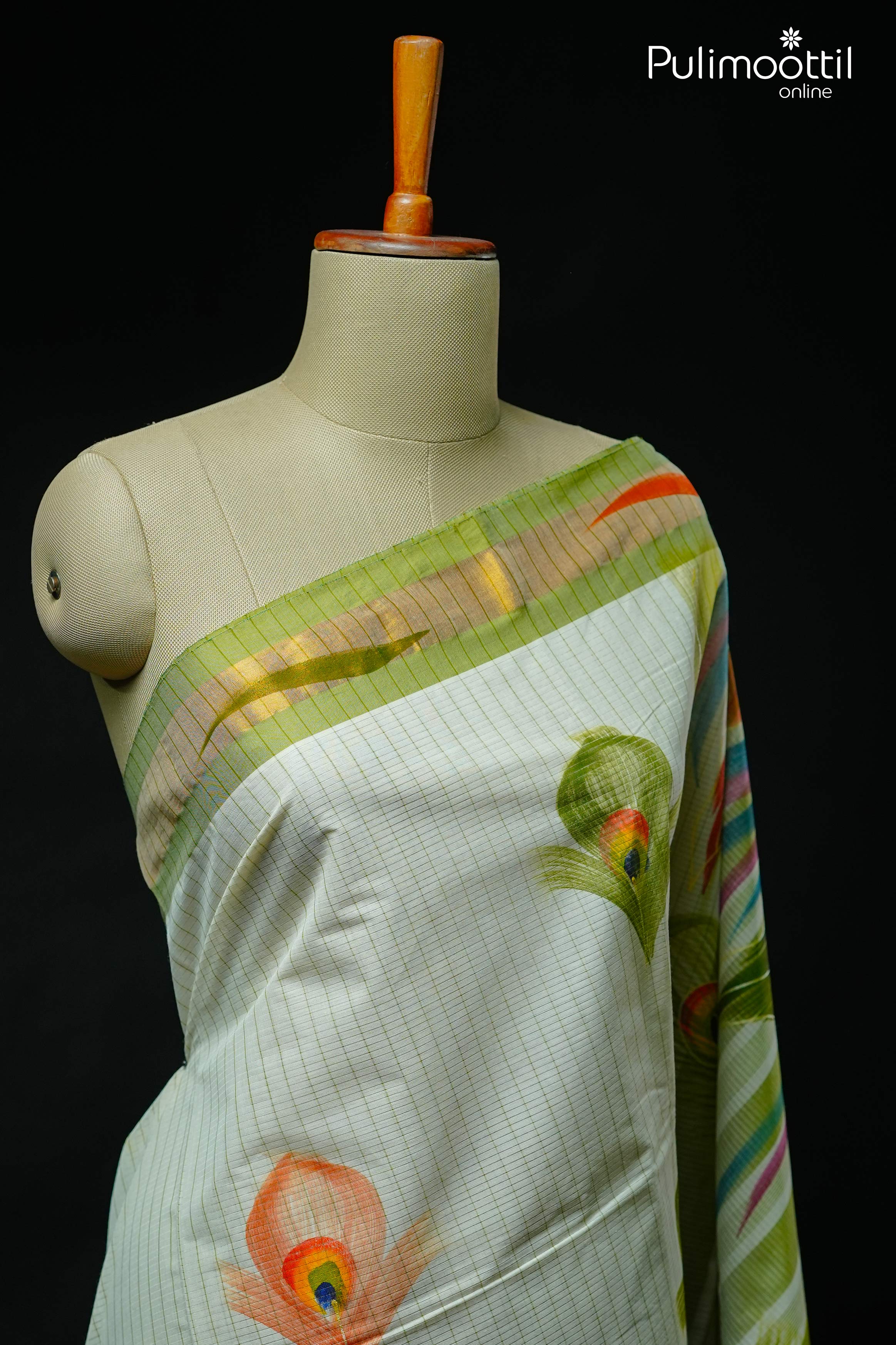 Cream Kerala traditional set saree with golden tissue border, stripes, and hand-painted peacock feather motifs, draped on mannequin.
