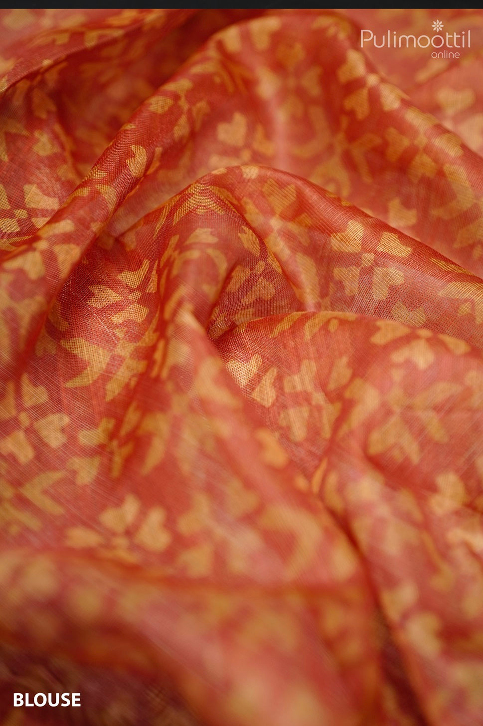 Red blouse fabric with golden floral motifs, matching the cream net cotta saree with red border and golden striped pallu.