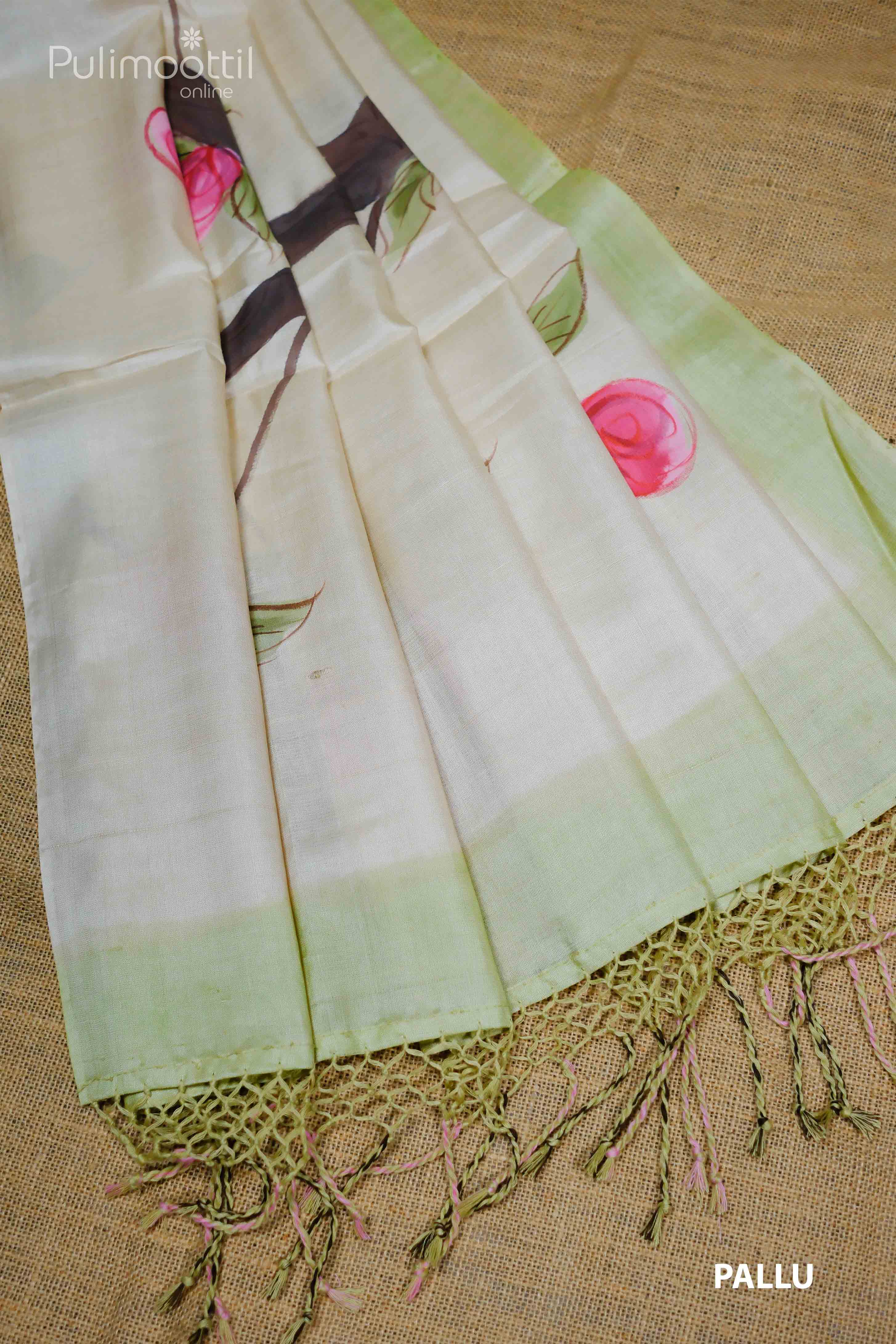 Pallu of Cream and Light Pista Green Pure Tussar Silk Saree with Floral Painting Design and Fringed Ends.