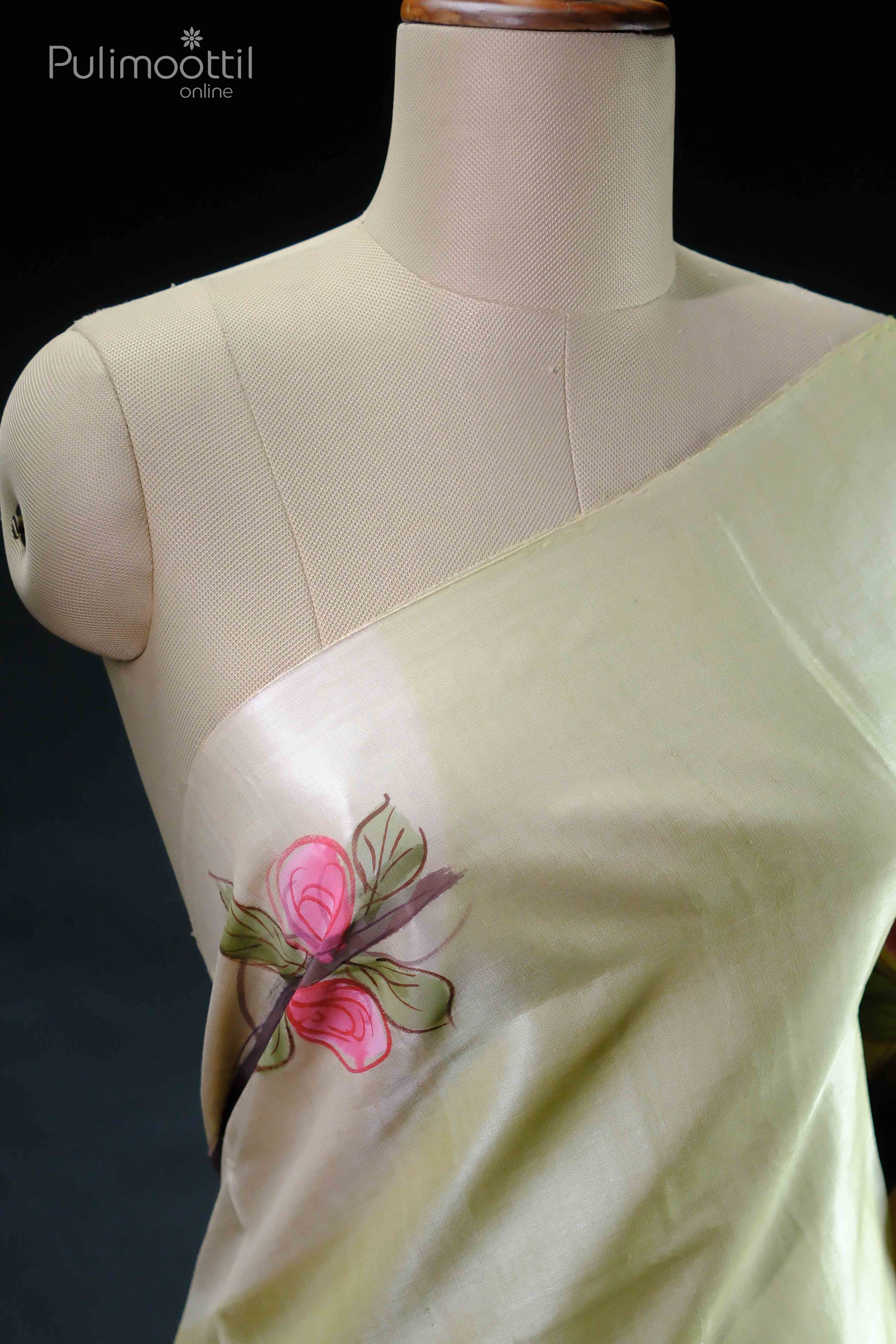 Cream and Light Pista Green Pure Tussar Silk Saree Draped on a Dress Form, Featuring Floral Painting Design.