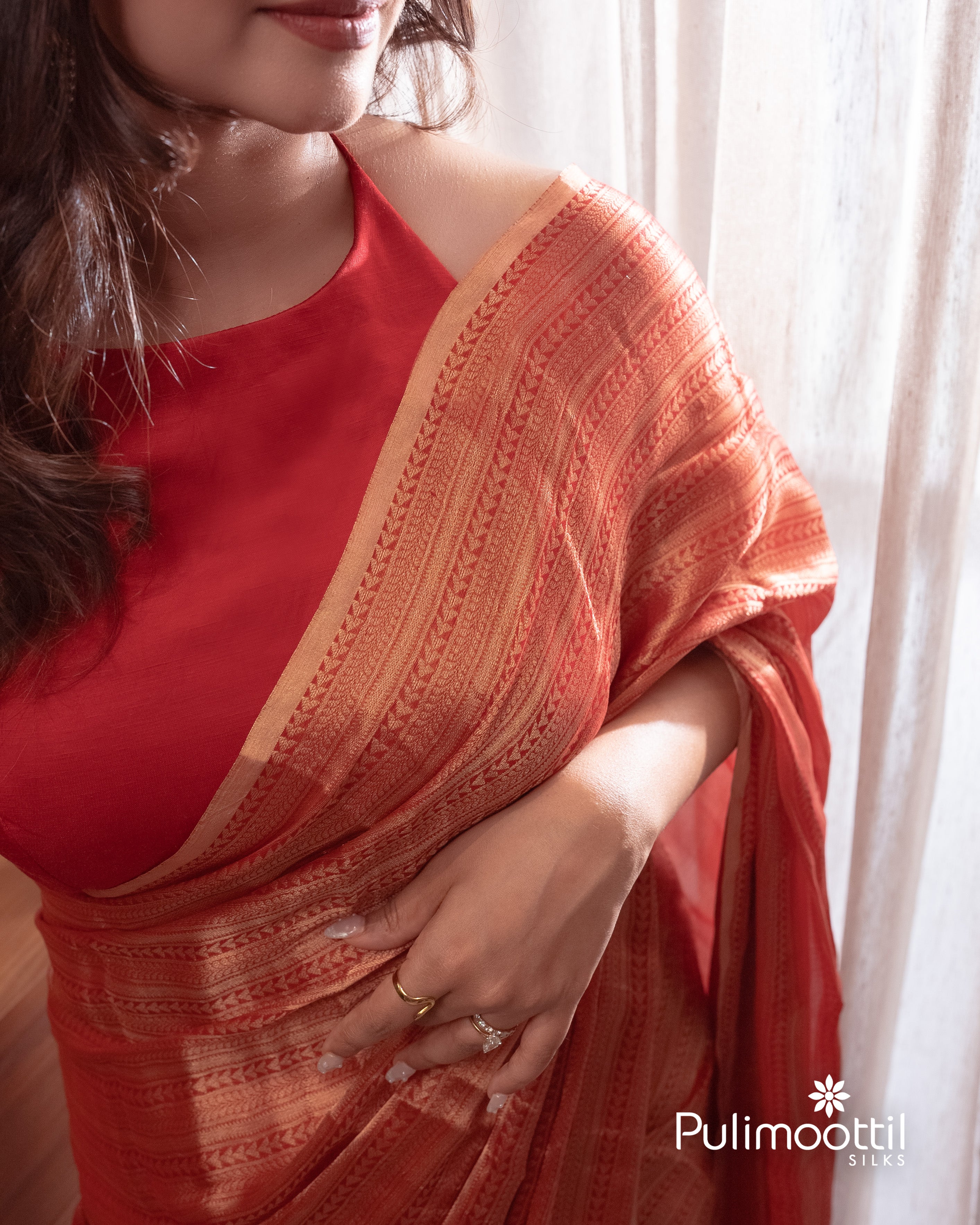 Red color pure Banarasi moonga chiffon khaddi saree.