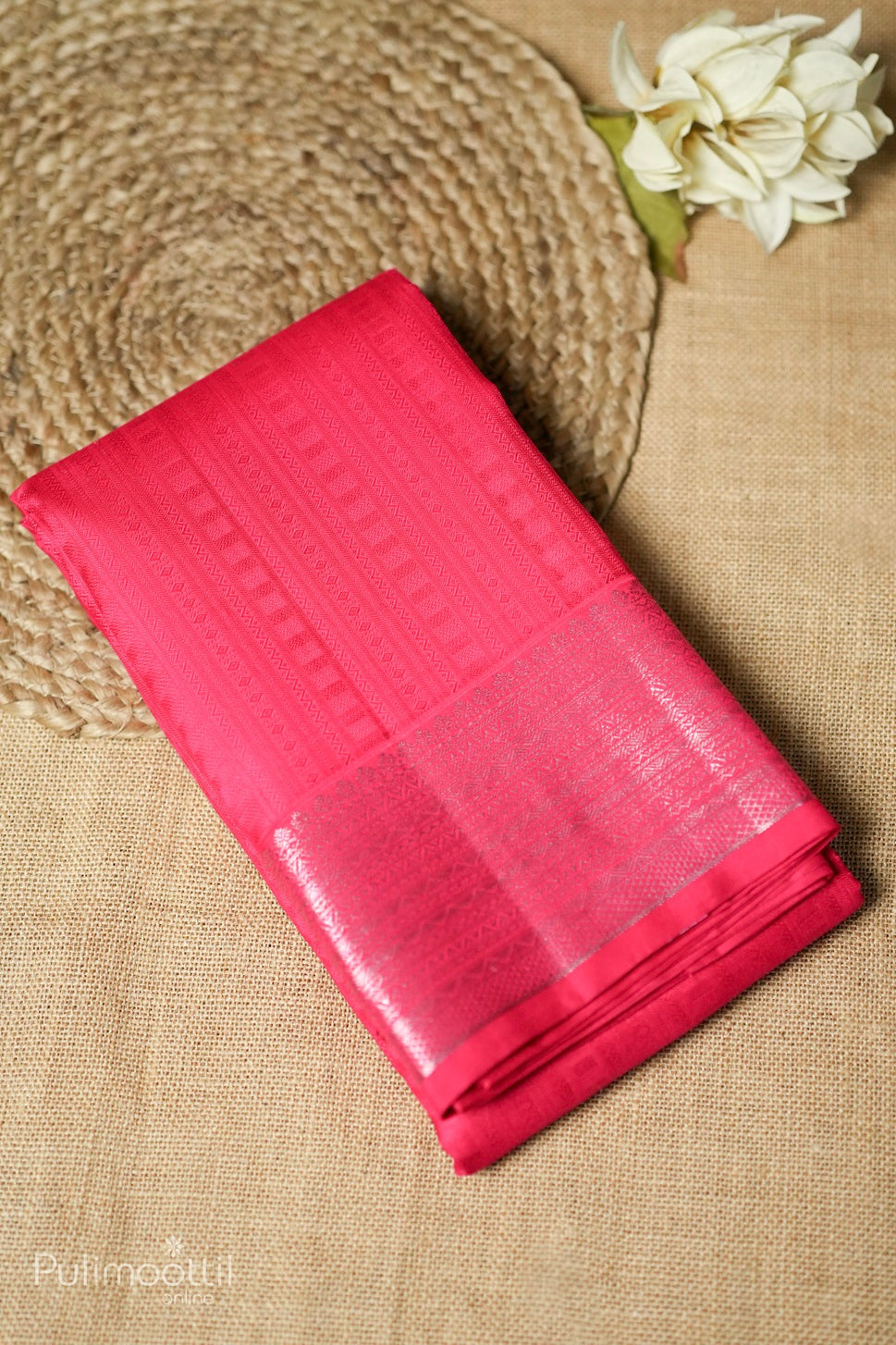 Rani pink-colored Kanchipuram self-print designer saree