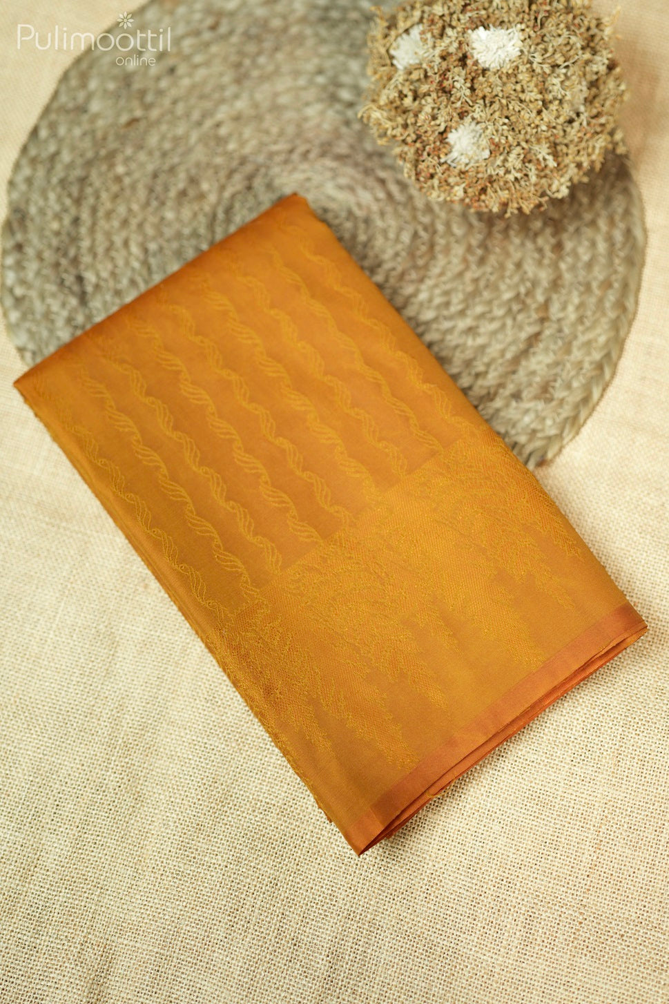 Ochre Colour Self Print Semi Silk Saree.