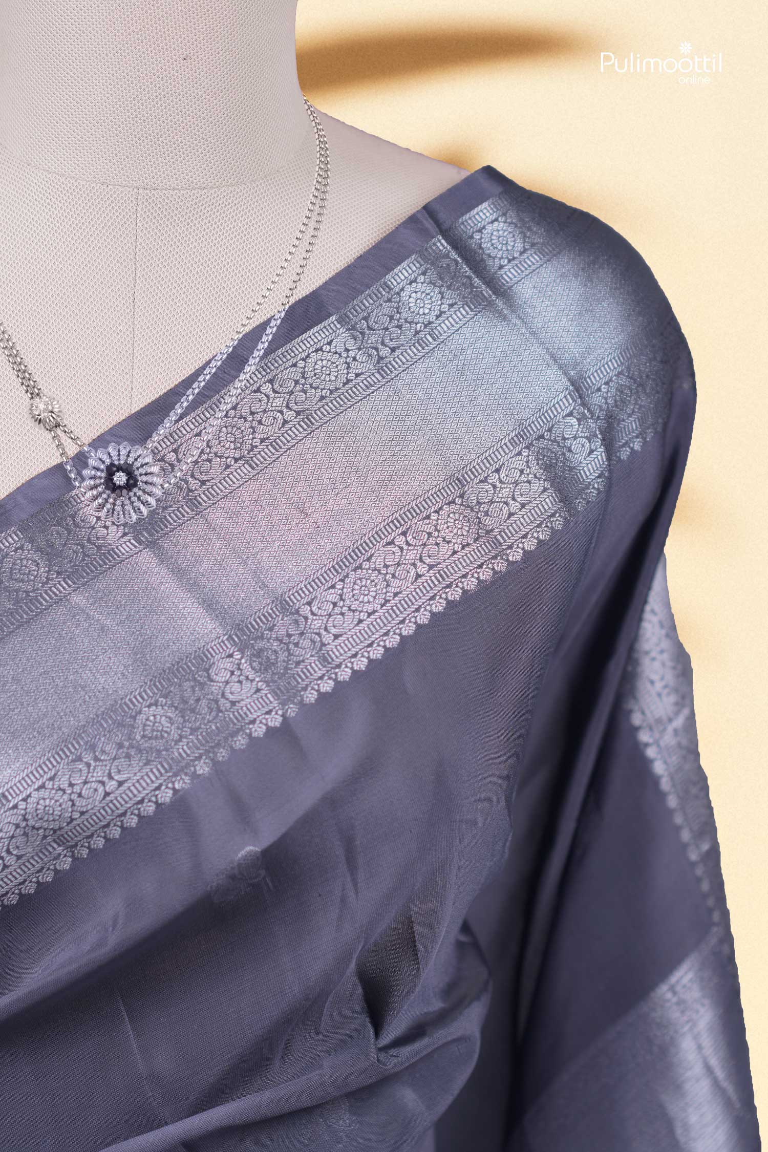 Pearl Grey Kanchipuram Saree.
