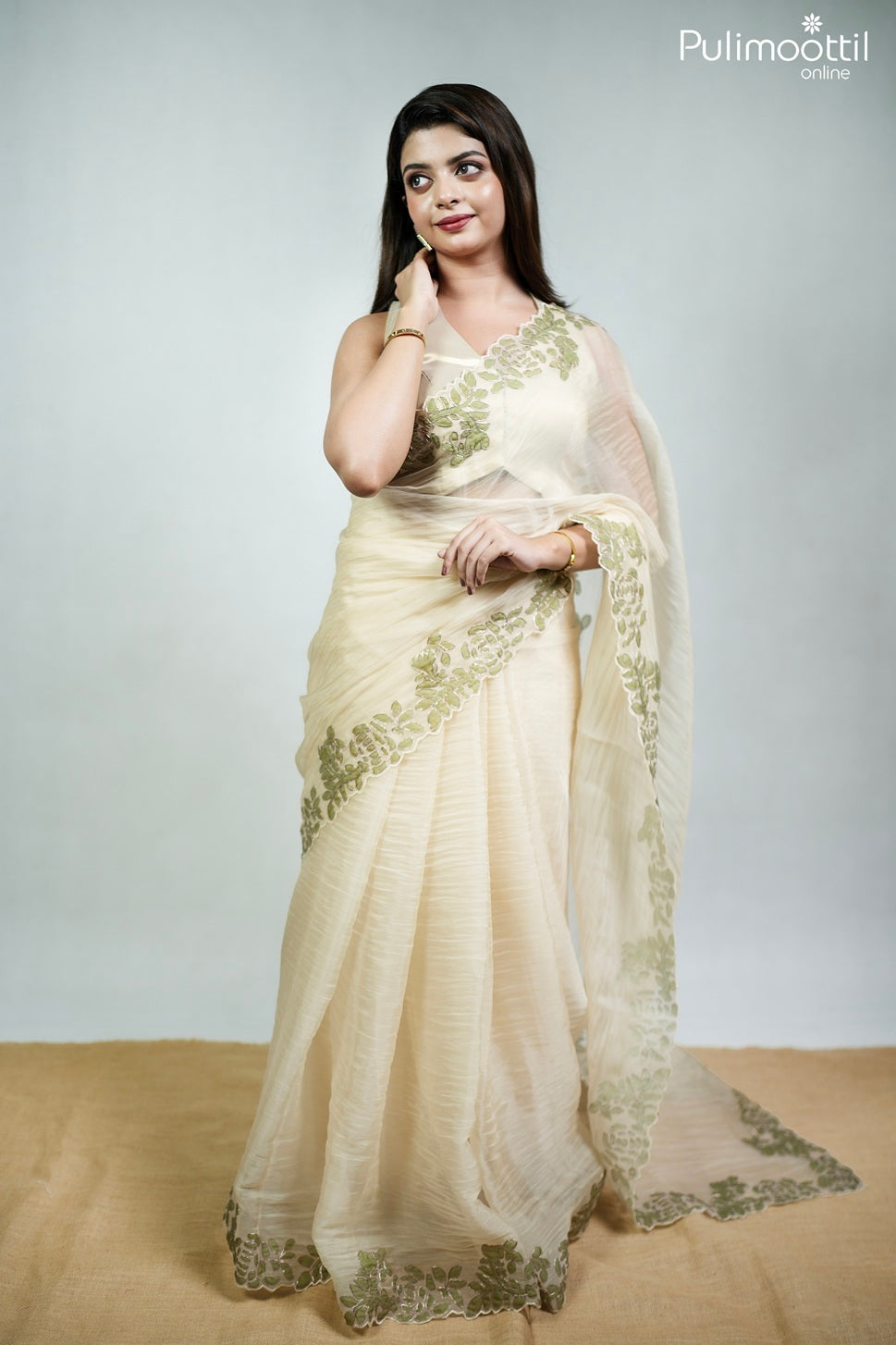 Ivory color crushed organza fancy saree