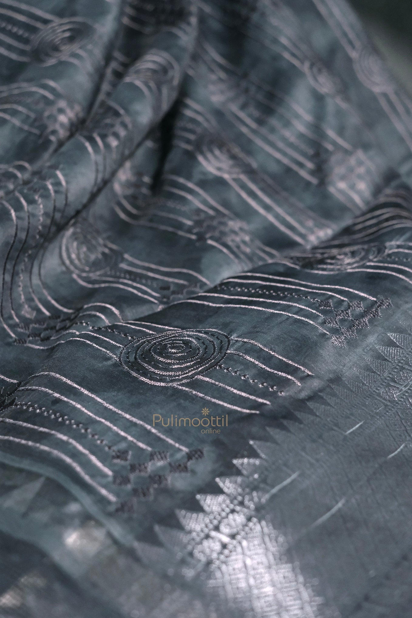 Styled product display — potentially part of a lookbook or catalog. The saree’s richness and festive appeal are well captured.