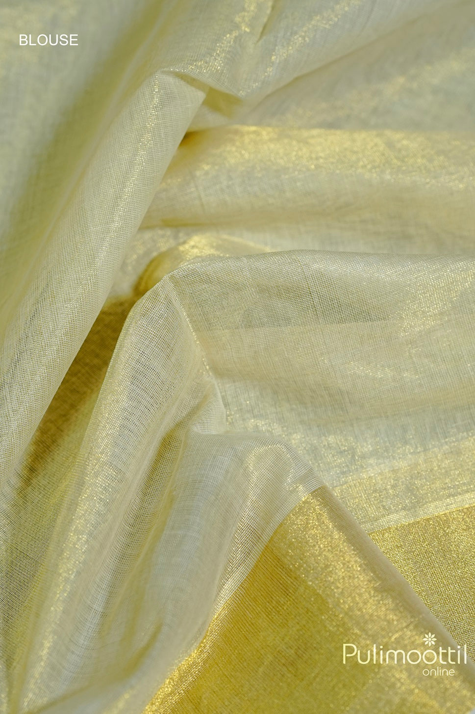 Close-up of the golden zari border of the Kerala traditional handloom saree with a golden tissue finish, showcasing the luxurious texture and shine.