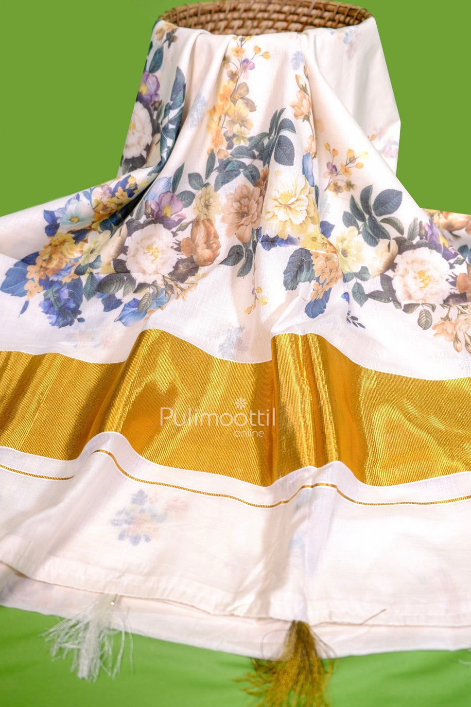 Elegant Kerala tissue saree with rich golden zari border and vibrant multicolor floral digital print on pallu, perfect for Onam and festive occasions.