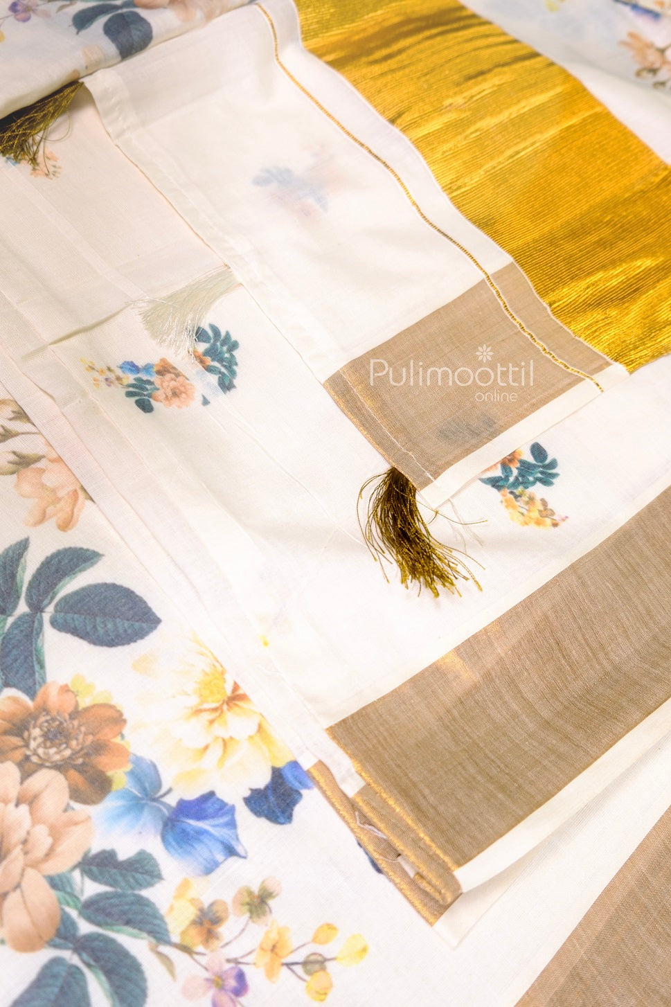Traditional Kerala saree with shimmering gold zari border and intricate floral digital print, perfect for online purchase of Onam sarees and Kerala set sarees.