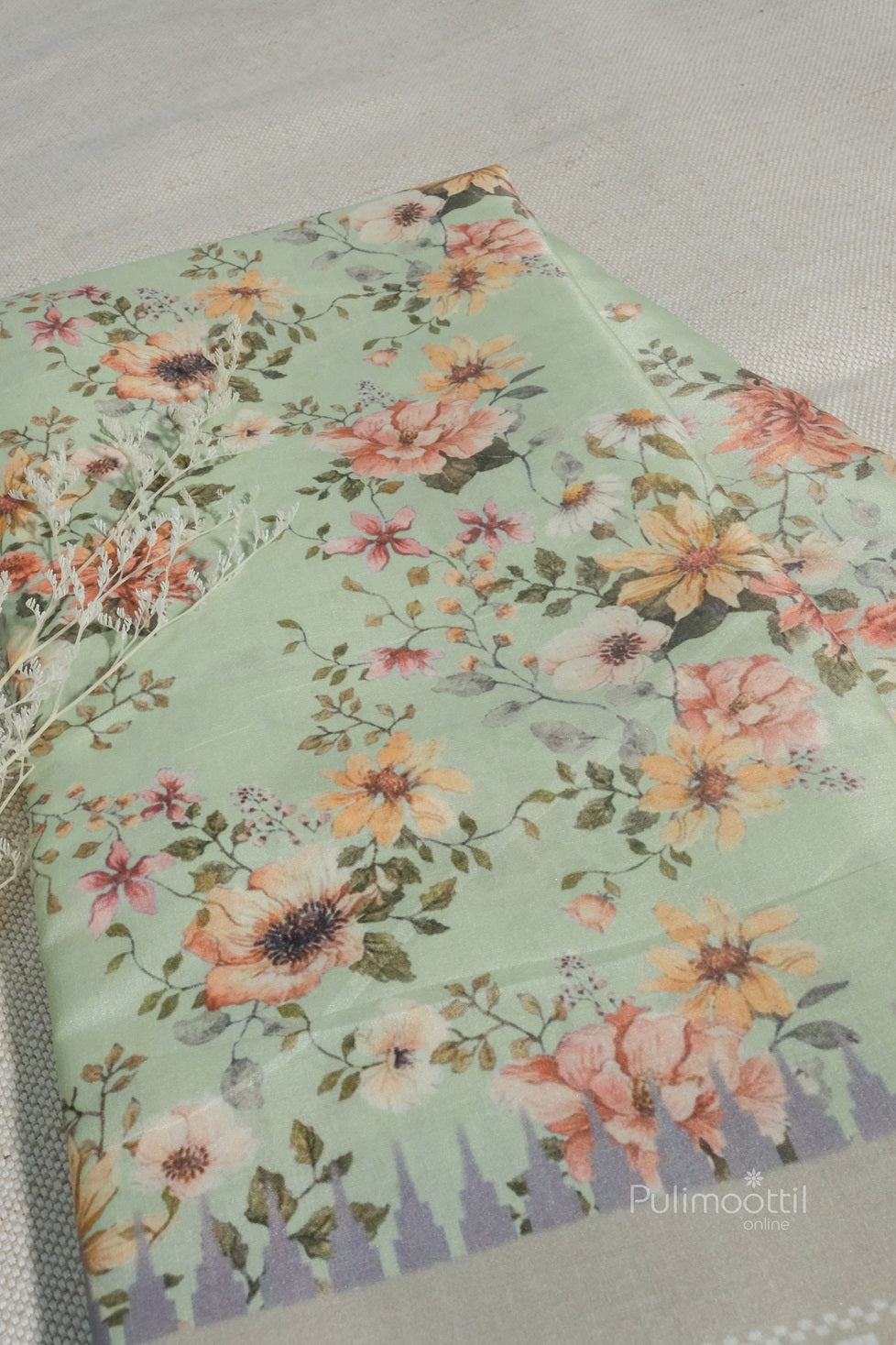 Light cyan semi-soft silk saree neatly folded and displayed with full view of the body and pallu. Subtle sheen and smooth texture visible.