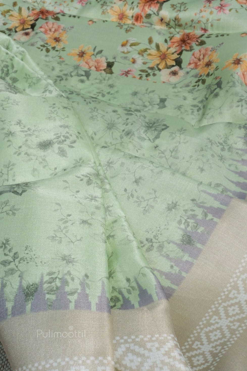 Fully spread semi-soft silk saree in light cyan, highlighting full length, pallu design, and elegant craftsmanship of the weave.