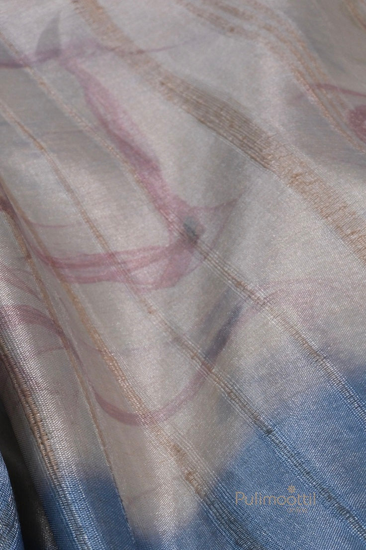 Detailed shot of blue pallu with vertical woven stripes on light gray and blue semi Tussar silk saree.