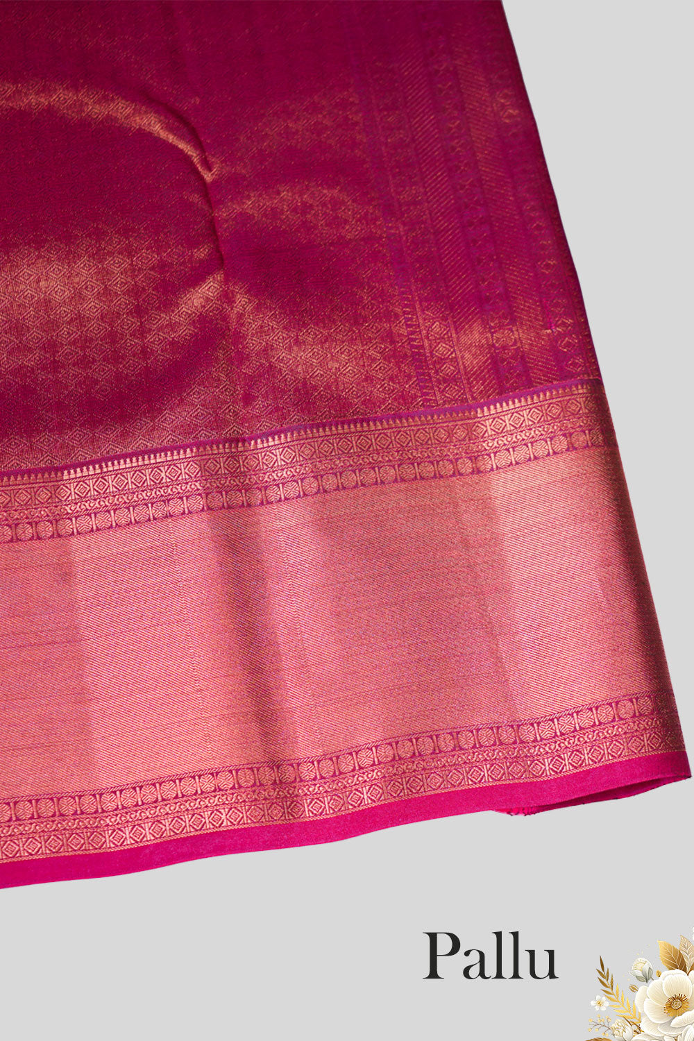 Pink zari pallu with intricate weaving, adding elegance to this vibrant Kanchipuram silk saree.