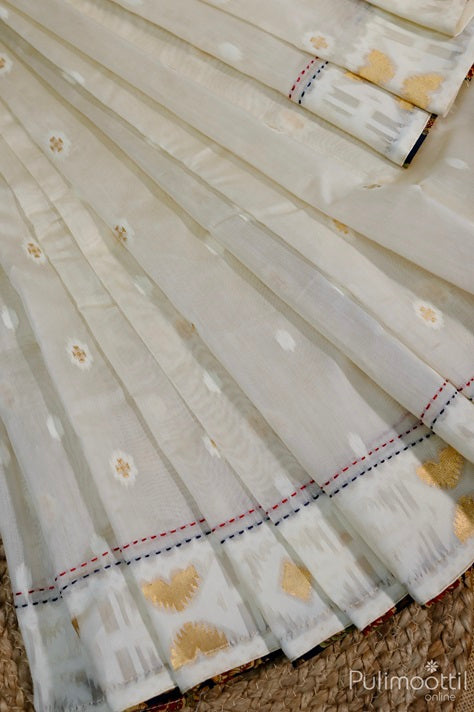 Off white Chanderi silk saree with golden zari butta and designer running stitch border – ideal for festive and wedding occasions