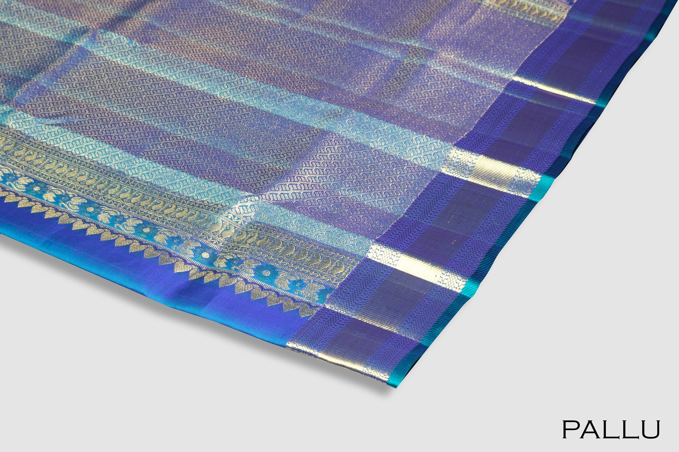 Peacock color pure Kanchipuram silk saree.