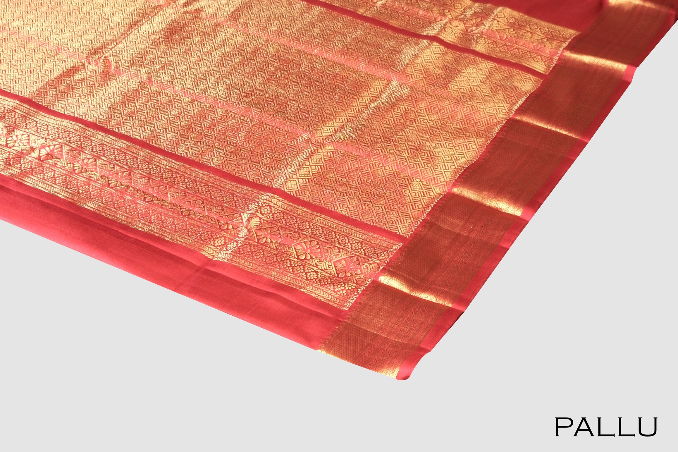 Red color pure Kanchipuram silk saree.