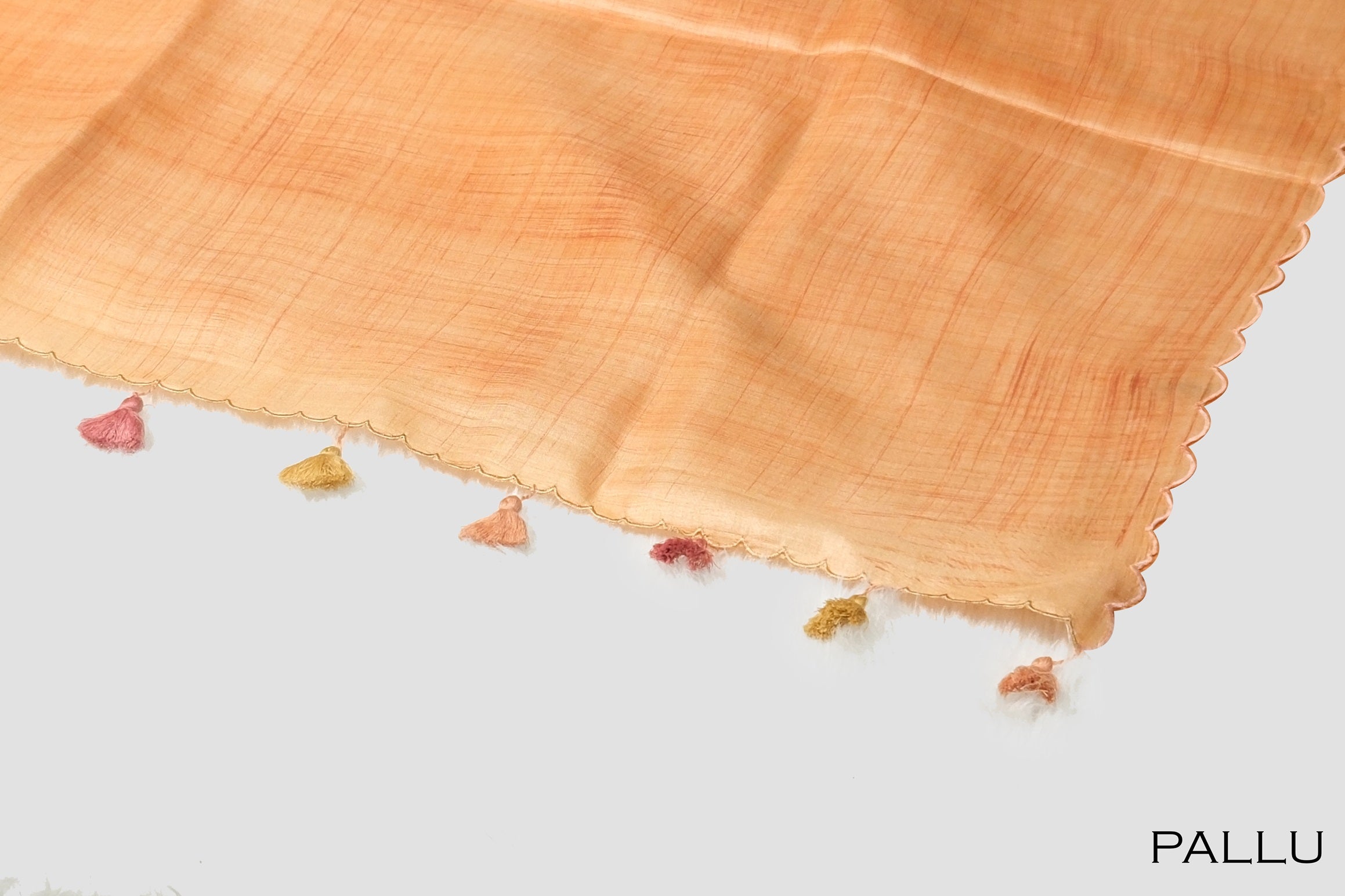 Orange color organza saree.