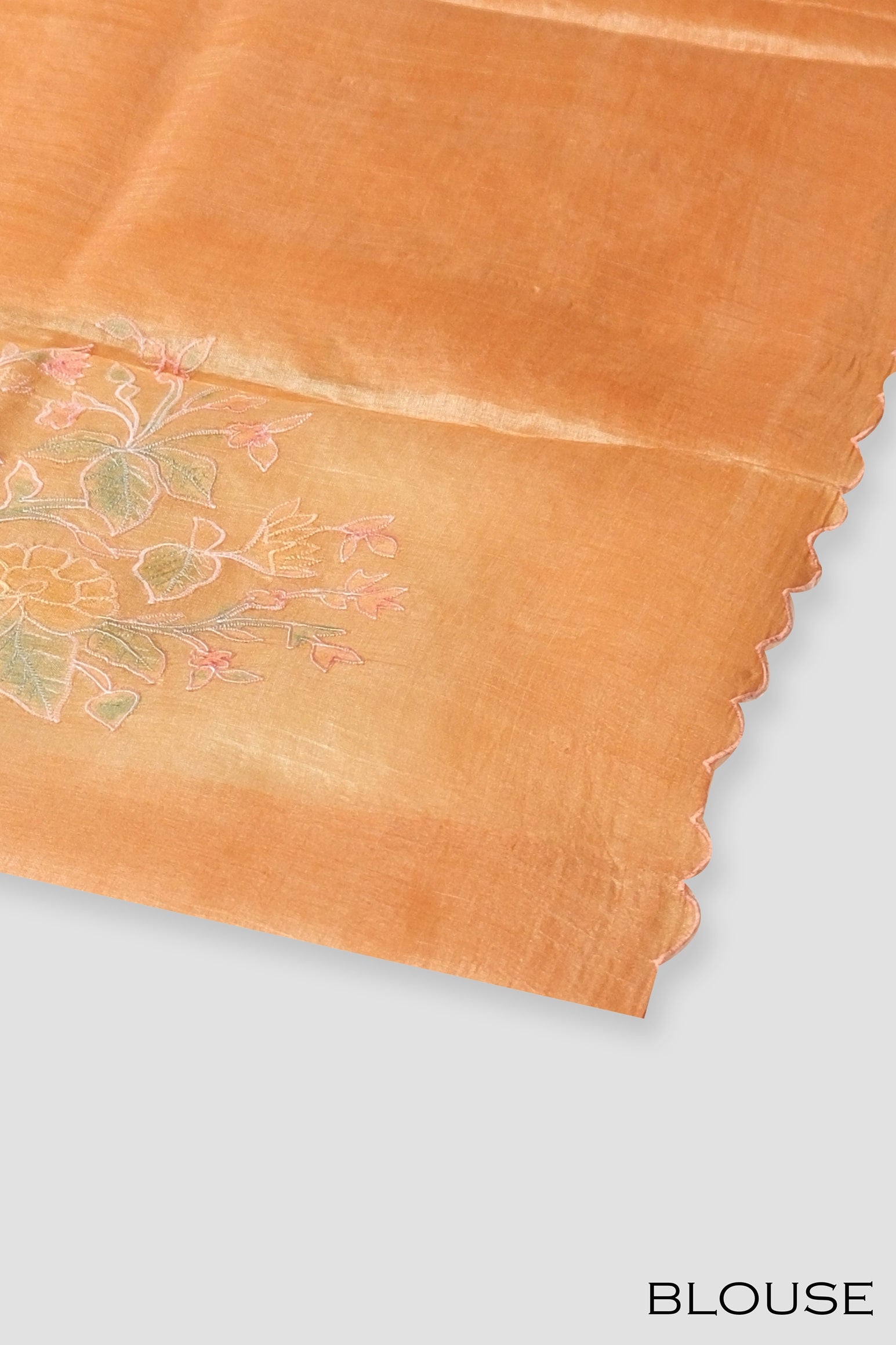 Orange color organza saree.