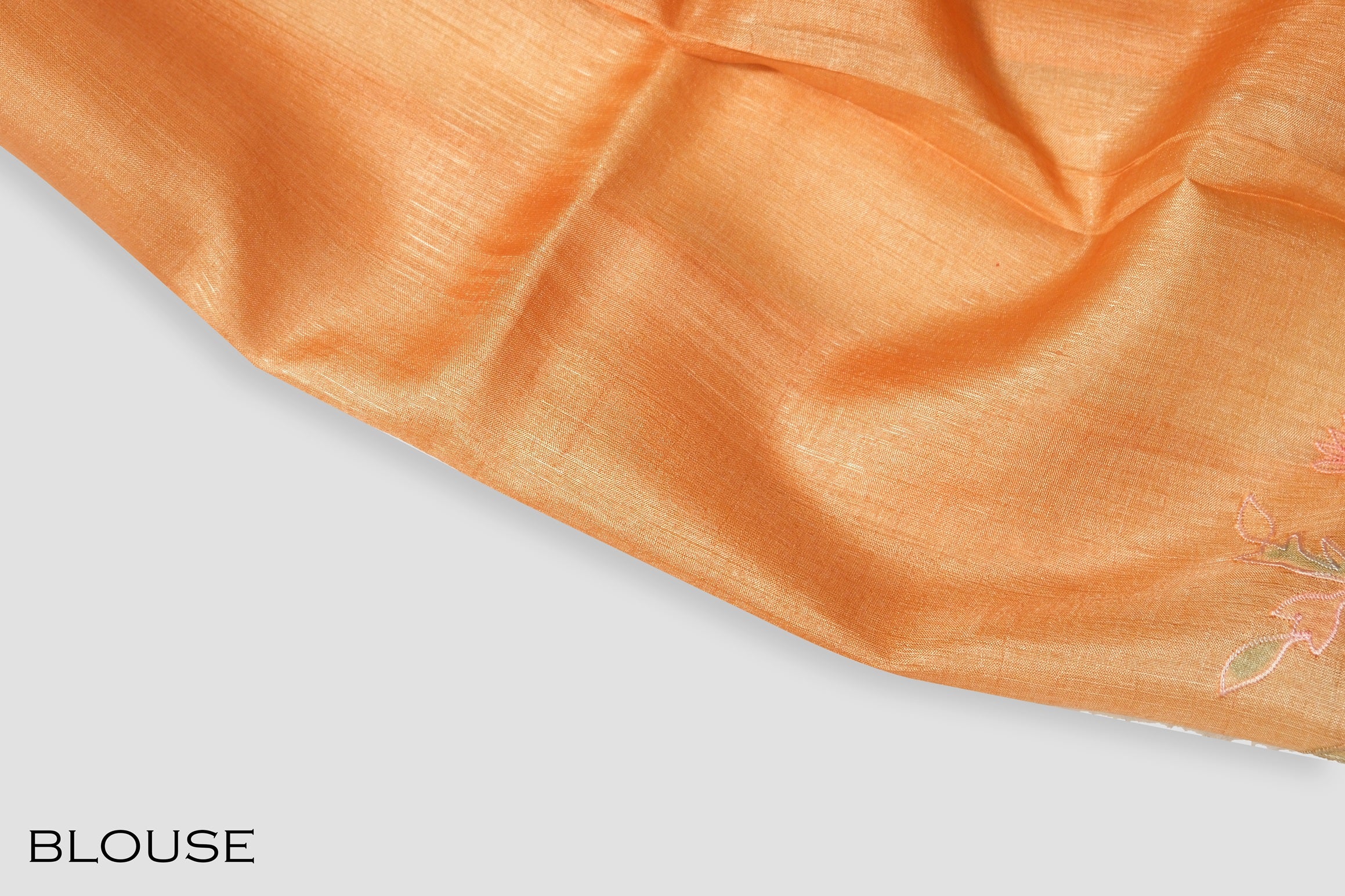 Orange color organza saree.