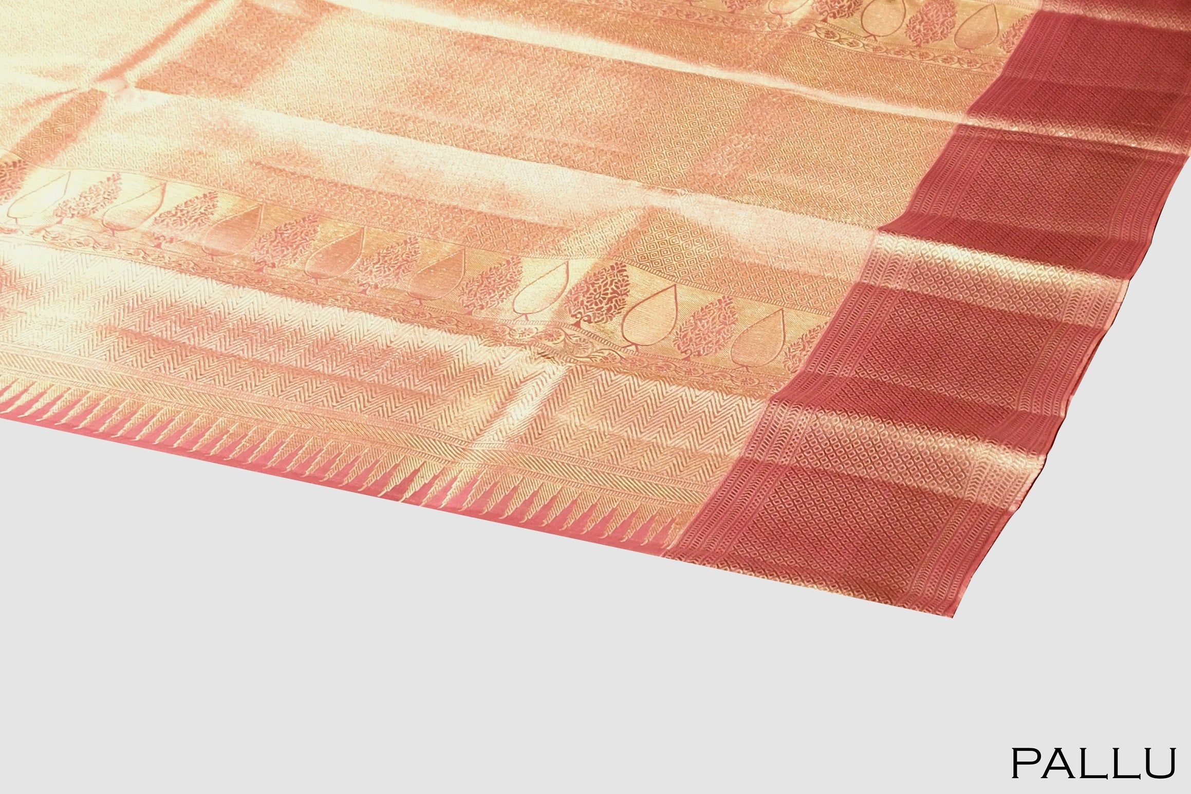 Light golden color tissue pure Kanchipuram wedding saree.